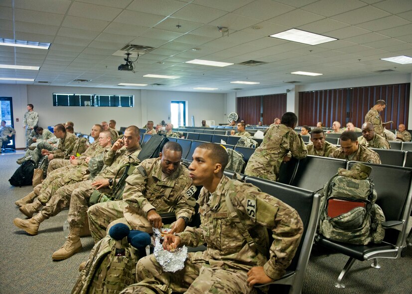 Airmen from Moody and several other bases relax at the deployment control center before leaving for a six-month deployment to Afghanistan, June 26, 2012, at Moody Air Force Base, Ga. The DCC was the Airmen’s final out-processing location before leaving the country. (U.S. Air Force photo by Senior Airman Eileen Meier/Released)