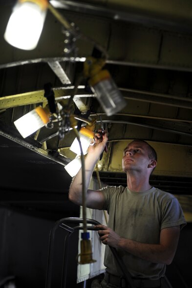 Airman 1st Class Corey Cutright, 2nd Aircraft Maintenance Squadron, inspects the wing of a B-52H Stratofortess bomber on Barksdale Air Force Base, La., June 27. Maintenance Airmen inspect the aircraft once it has accumulated 450 flight hours to ensure there are no missing or damaged parts. (U.S. Air Force photo Airman 1st Class Micaiah Anthony)(RELEASED)