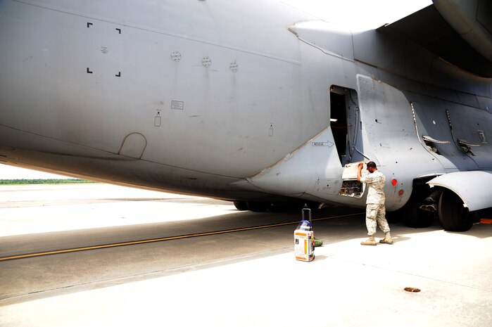 Airman 1st Class Devin Lorenzi, 437th Aircraft Maintenance Squadron Aerospace Maintenance journeyman from Joint Base Charleston, S.C., inspects a C-17 Globemaster III, June 22, 2012. JB Charleston has 54 C-17’s. The 437th AMXS Aerospace technicians perform inspections on the aircraft to ensure that they are ready for any mission. (U.S. Air Force photo/ Airman 1st Class Chacarra Walker) 