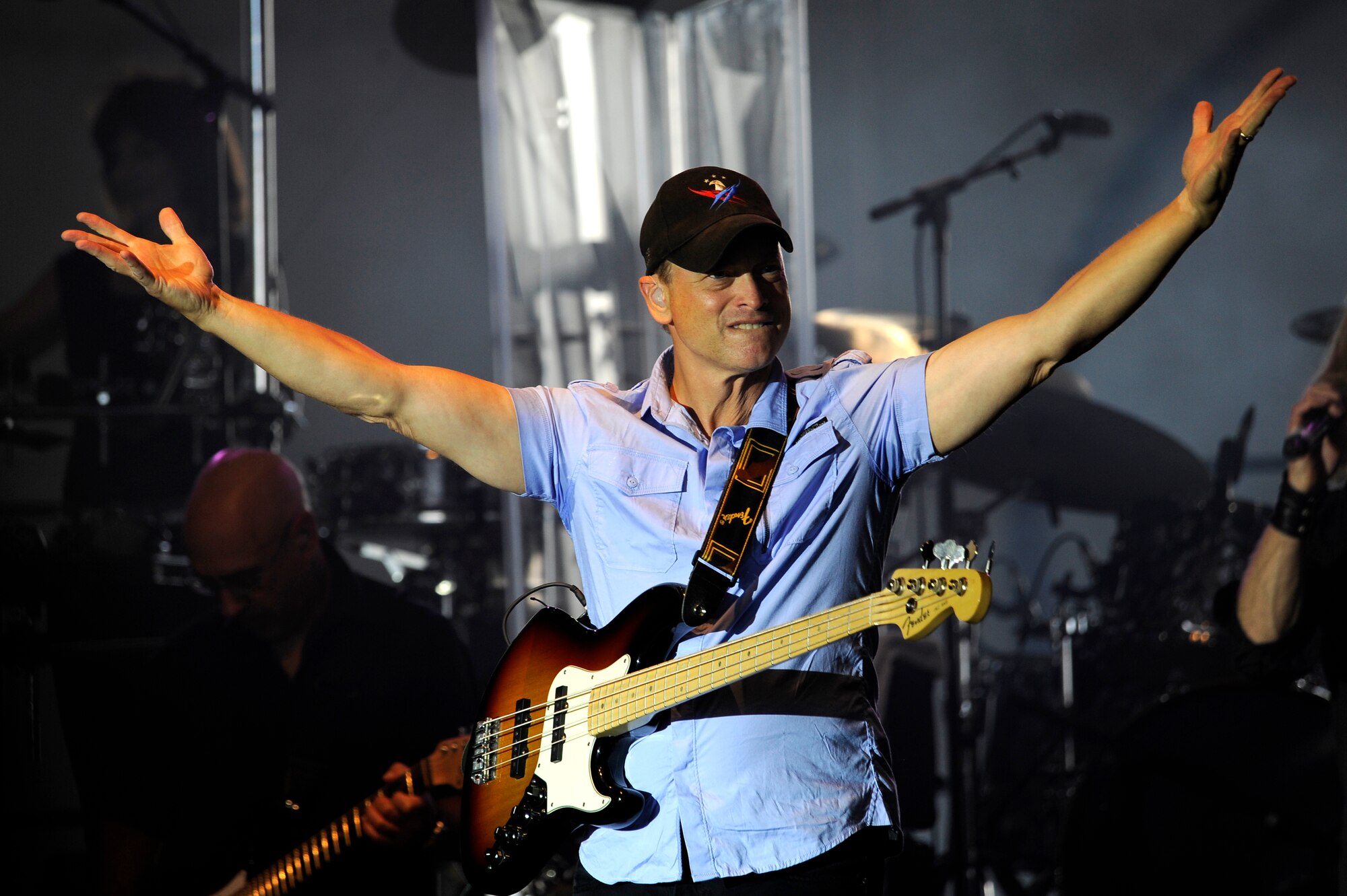 Gary Sinise hypes up an audience during his Lt. Dan Band performance June 23, 2012, Eielson Air Force Base, Alaska. The band is named after the character Lieutenant Dan Taylor, whom Sinise portrayed in the film Forrest Gump. (U.S. Air Force photo/ Staff Sgt. Jim Araos)