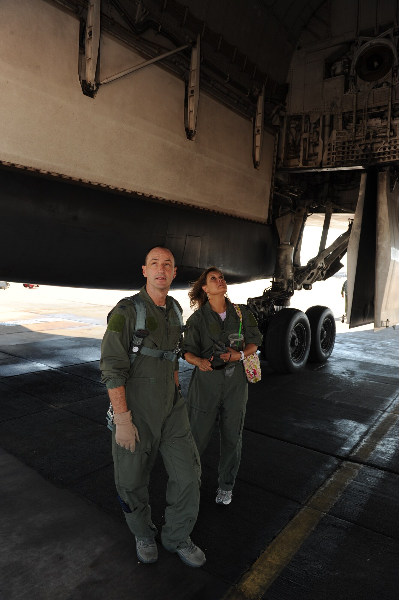 U.S. Air Force Col. David Béen, 7th Bomb Wing commander, and his wife Liz Béen conduct a pre-flight inspection on a B-1 Bomber prior to his final flight June 26, 2012, at Dyess Air Force Base, Texas. Following a change of command ceremony July 3, Col. Béen will depart Dyess and will be assigned to the Pentagon in Washington, D.C. (U.S. Air Force photo by Airman 1st Class Peter Thompson / Released)