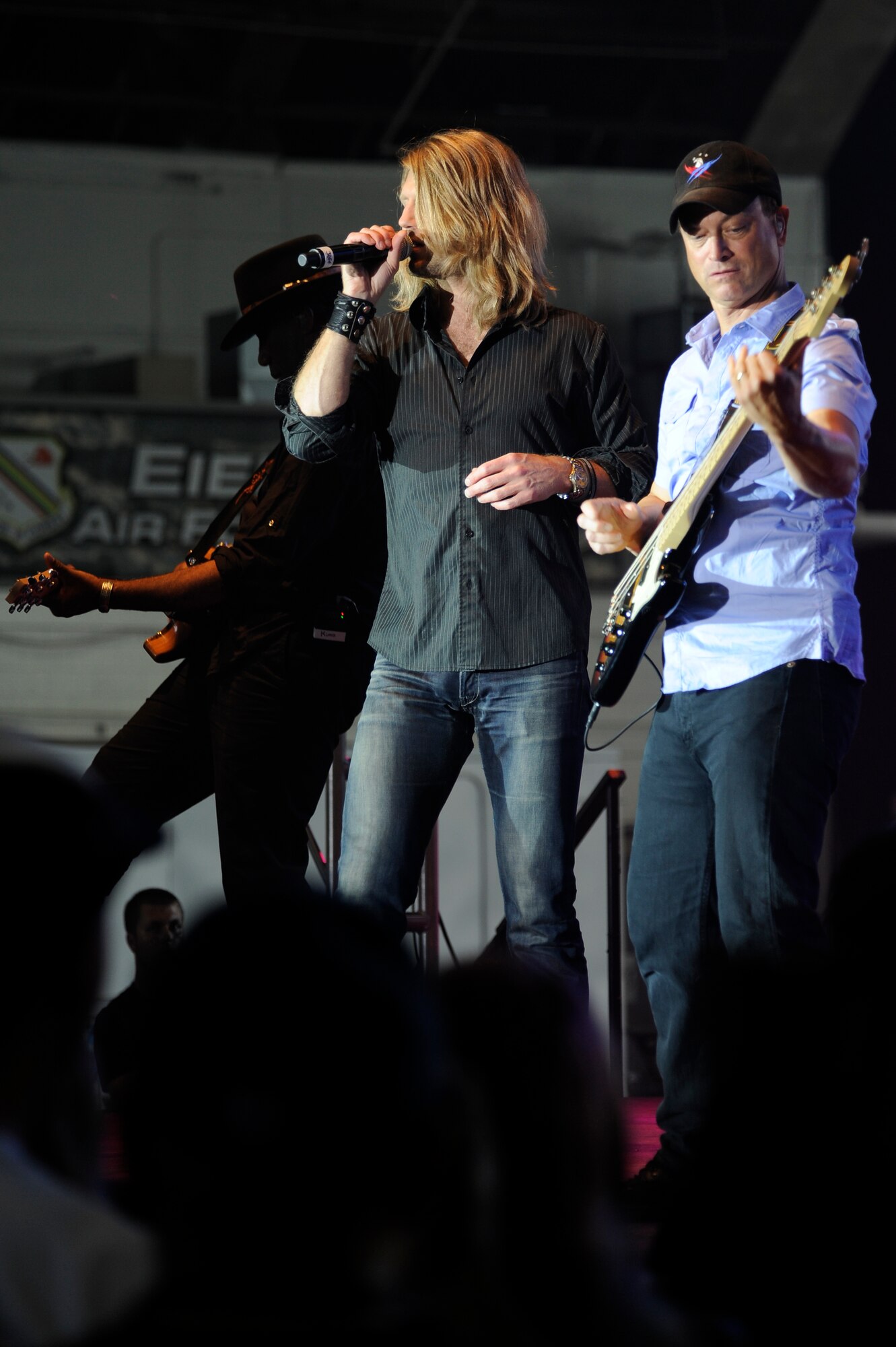 Gary Sinise and Lt. Dan Band perform for service members and their families June 23, 2012, Eielson Air Force Base, Alaska. The Lt. Dan Band is a cover band on the road to entertaining our servicemen and women across the U.S. (U.S. Air Force photo/ Staff Sgt. Jim Araos)