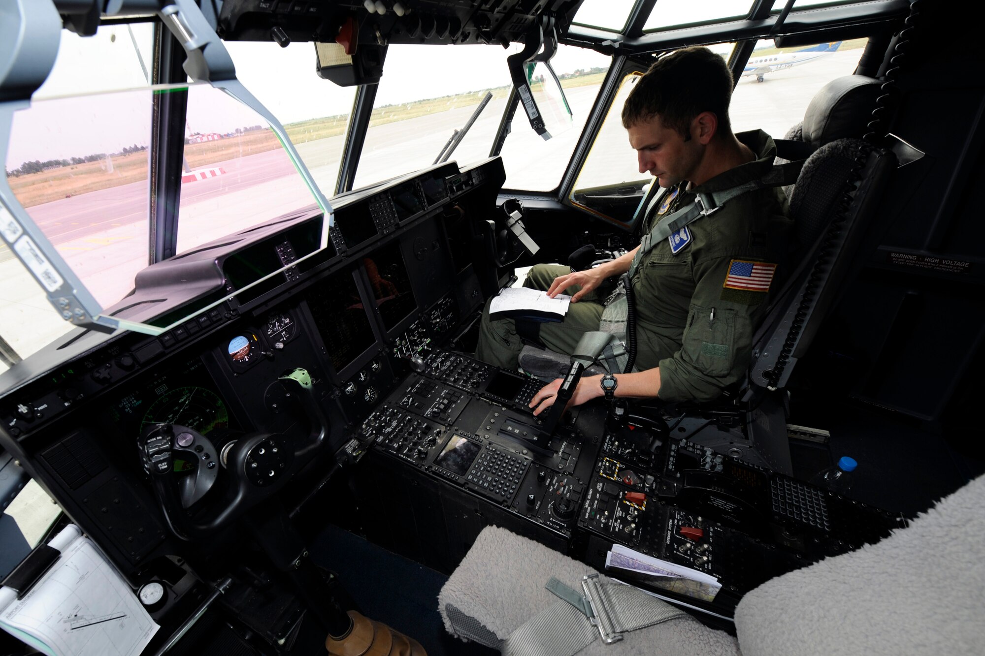 Capt. Capt. Jameson Richart, 37th Airlift Squadron and the Thracian Spring mission commander, does a pre flight inspection on a C-130J Super Hercules in Plovdiv, Bulgaria during the Thracian Springs 2012, June 23, 2012. Thracian Spring 2012 is a two week on-site training designed to build partnerships between the U.S. and Bulgarian Air Force. (U.S. Air Force photo/Senior Airman Aaron-Forrest Wainwright)