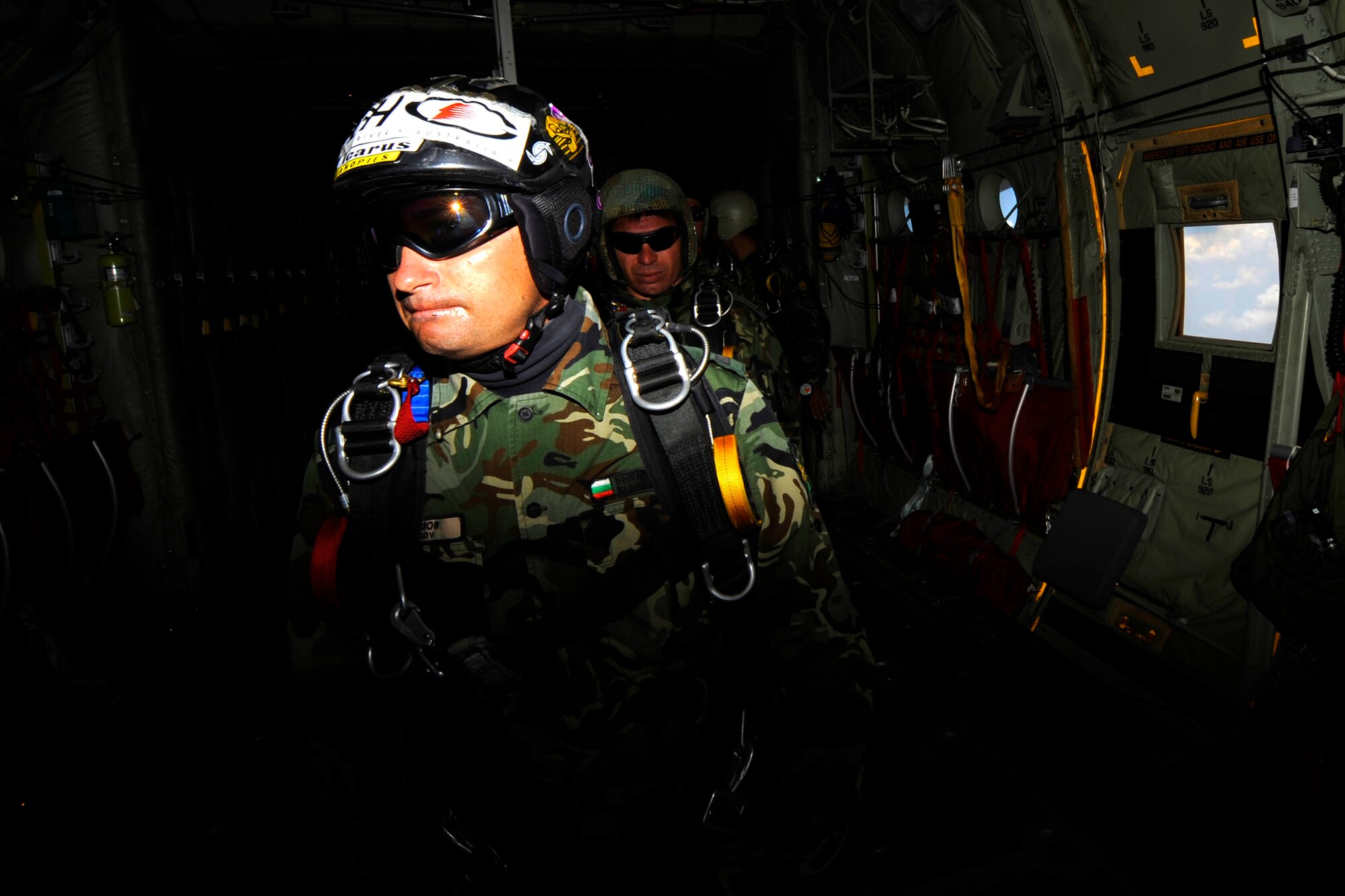 Petty Officer First Class Nikolai Nikolov Bulgarian navy special forces unit, jumpmaster, waits to jump from a C-130J Super Hercules in Plovdiv, Bulgaria during the Thracian Springs 2012, June 23, 2012. Thracian Spring 2012 is a two-week on-site training designed to build partnerships between the U.S. and Bulgarian Air Force. (U.S. Air Force photo/Senior Airman Aaron-Forrest Wainwright)