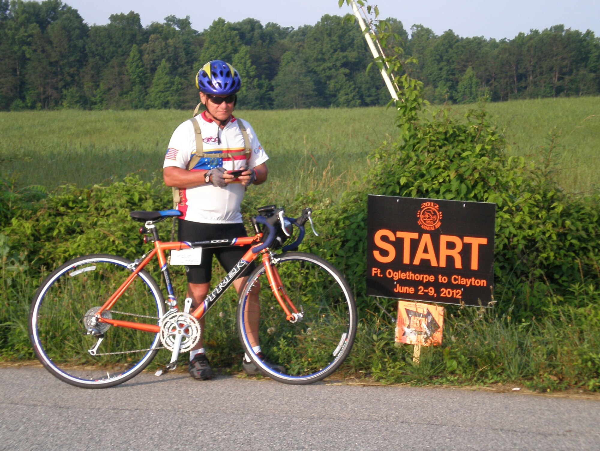 Ron Helms sends a text before starting the Bicycle Ride Across Georgia, a 359-mile ride from Fort Oglethorp to Tiger in the foothills of Georgia’s Appalachian Mountains June 2-9, 2012. The 56-year-old captain embraces physical fitness as a “fun” lifestyle. (Courtesy photo)