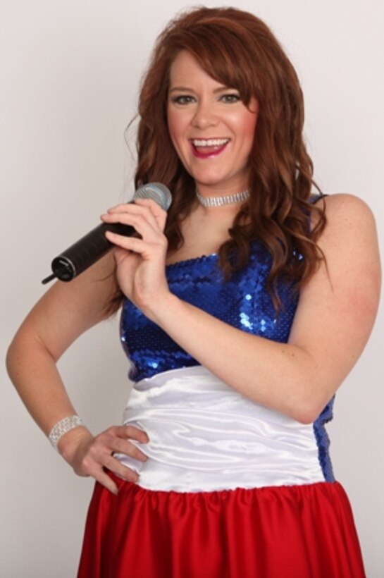 Capt. Ashley Elmore, 28th Force Support Squadron manpower and personnel flight commander, is among the Tops in Blue performers who will hit the Rushmore Plaza Civic Center stage in Rapid City, S.D., July 2. From the field of nearly 90 Airmen who participated in the talent search earlier this year, only the top 35 entertainers were selected. (U.S. Air Force Courtesy Photo/Released)