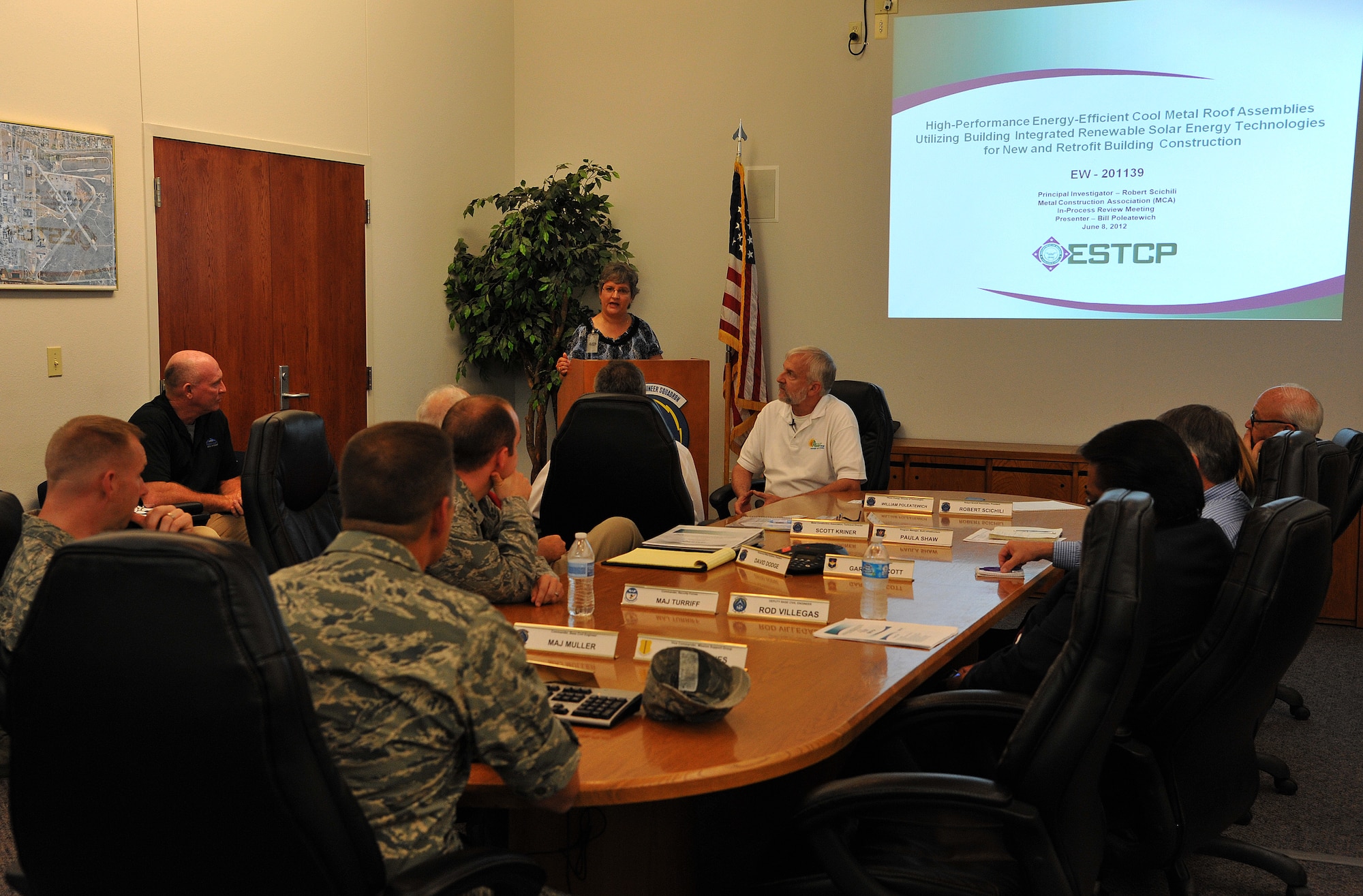 GOODFELLOW AIR FORCE BASE, Texas-- Mary Lumsdon, 17th Civil Engineering Squadron, opens up the meeting discussing the new 17th Security Forces Squadron High-Performance Energy-Efficient Cool Metal Roof June 27. The new roof produces solar energy to the building and also helps to collect rain water. (U.S. Air Force photo/Airman 1st Class Michael Smith) 