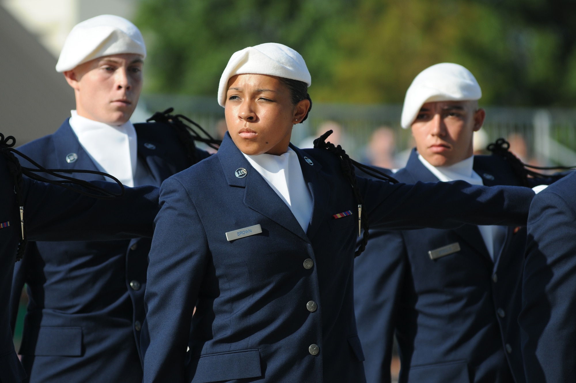 Airmen Basic Christian Williams, Bianca Brown and Cody Steele, 334th Training Squadron, face “eyes right” during the regulation portion of the drill down competition June 22, 2012, at Keesler Air Force Base Miss.  The Gators placed first in both regulation and freestyle drill competition.  (U.S. Air Force photo by Kemberly Groue)