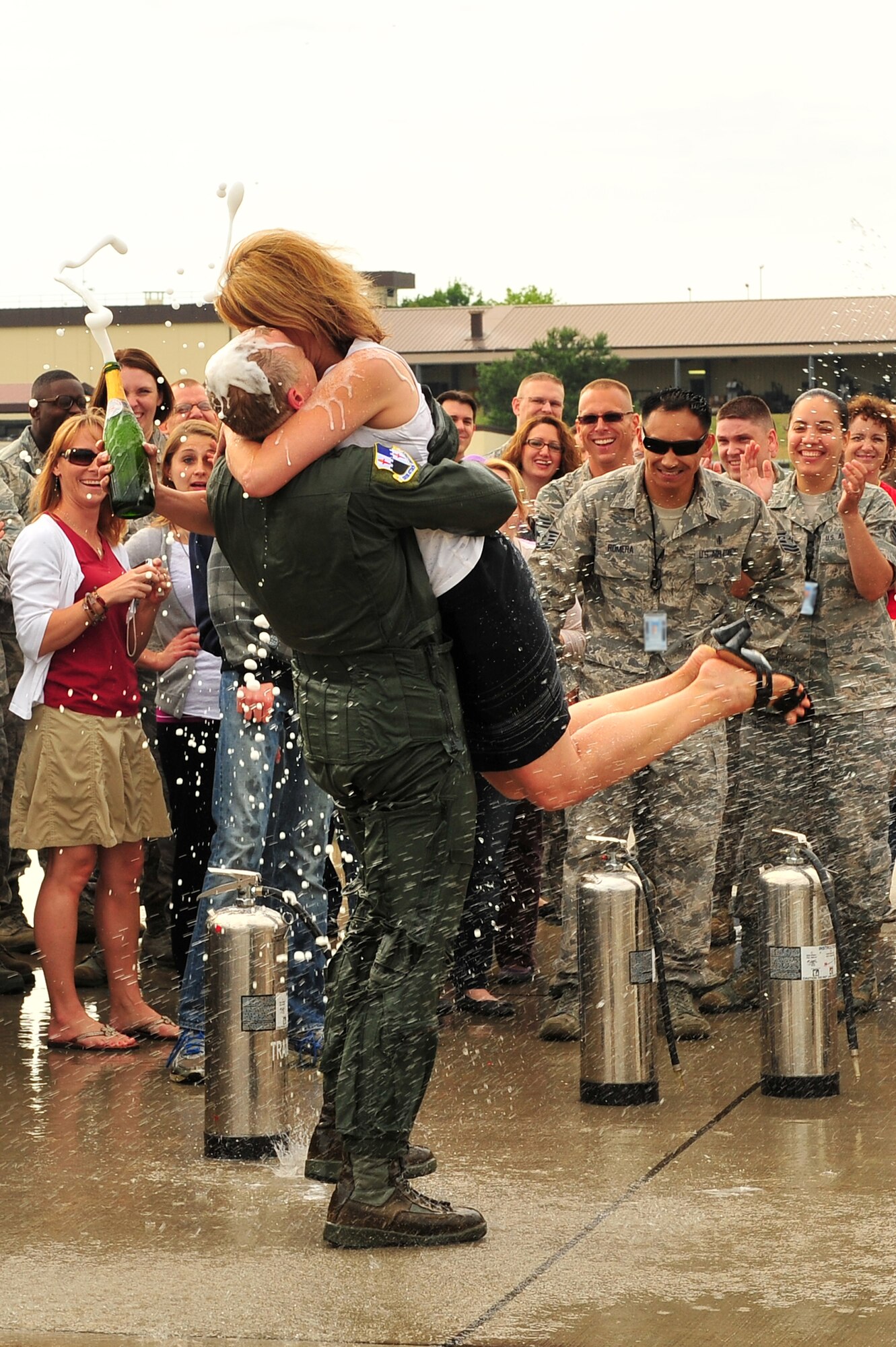 SPANGDAHLEM AIR BASE, Germany – Brig. Gen. Chris Weggeman, 52nd Fighter Wing commander, embraces his wife, Ann, after landing his final F-16 Fighting Falcon flight here June 21. Weggeman commanded the 52nd FW for two years. (U.S. Air Force photo by Airman 1st Class Dillon Davis/Released)