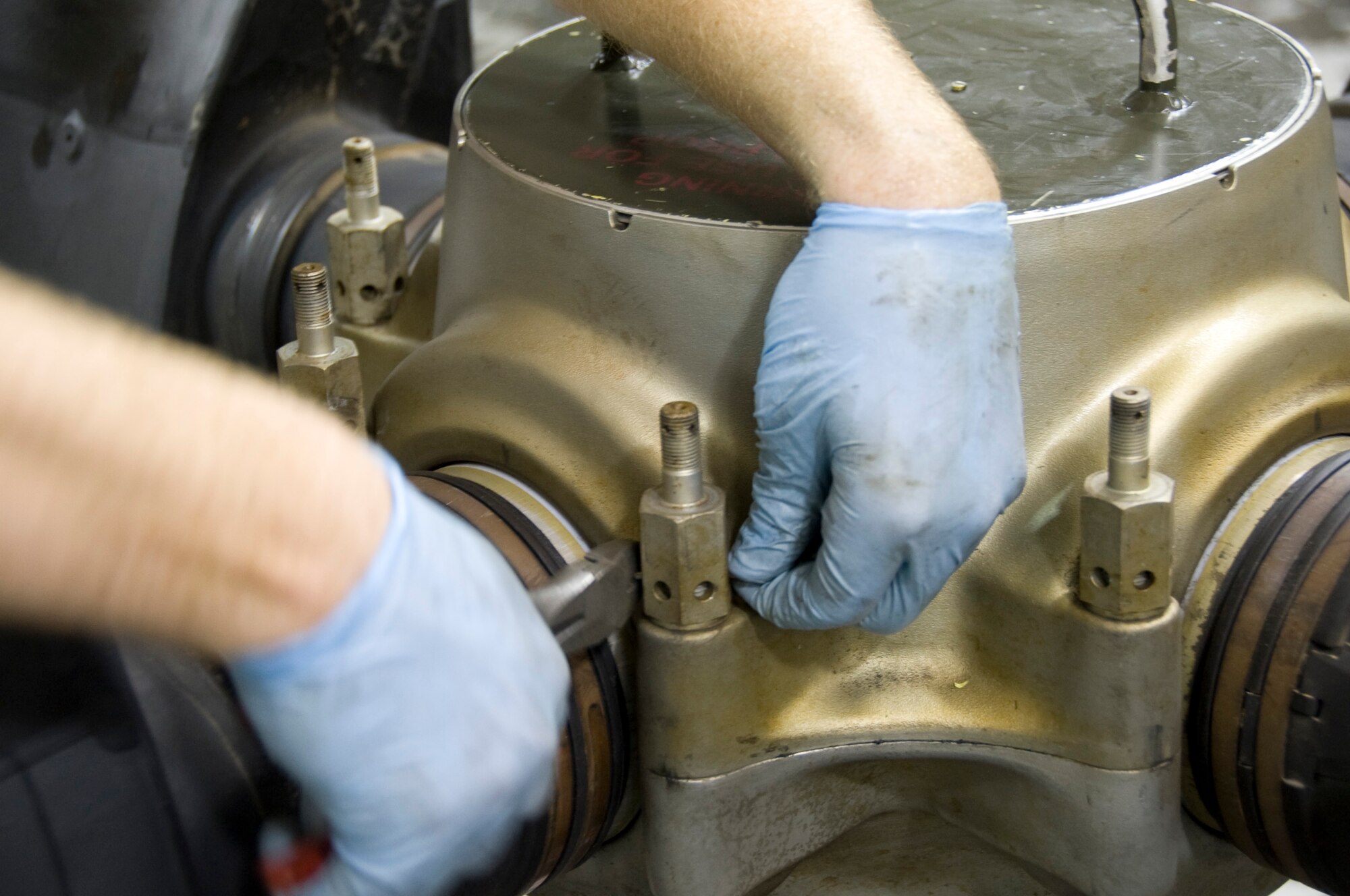 Airman 1st Class Nicholas Steffen, 379th Propulsion Centralized Repair Facility technician continues the disassembly process of a C-130 Hercules propeller here June 27, 2012. A new two- and three-day flow process implemented has increased the propellers average time on wing from 585 hours in September to more than 2,000 hours now. (U.S. Air Force photo/Senior Airman Bryan Swink)