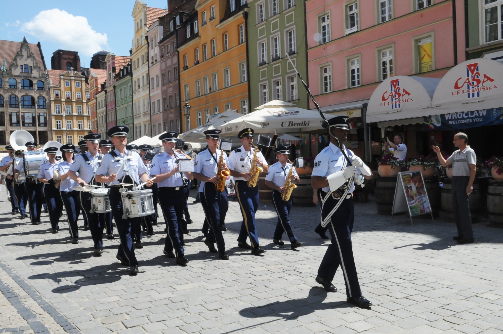 The U.S. Air Forces in Europe band marches through Market Square during a parade June 23, 2012, in Wroclaw, Poland. The parade was part of the International Air Force Bands Festival June 21-24, in Wroclaw. (U.S. Air Force photo by Senior Airman Marissa Tucker/Released)