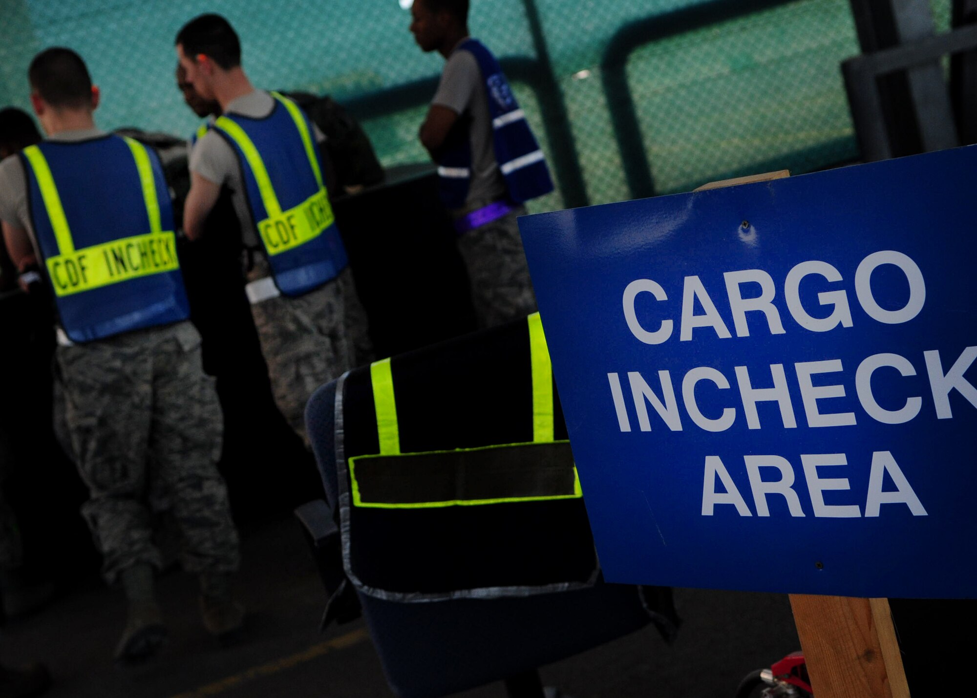 Members of the 31st Logistics Readiness Squadron prepare a cargo pallet for a simulated deployment as part of a local readiness exercise at Aviano Air Base June 18. During the four-day exercise, members simulated deploying in support of a contingency, going through preparation processes, base attacks and flying missions. (U.S. Air Force/Staff Sgt. Evelyn Chavez)
