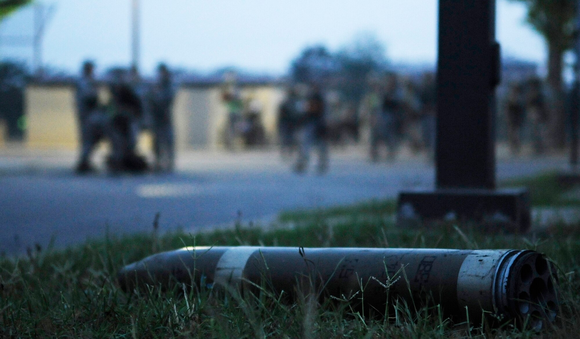 An unexploded ordnance lies on the ground after being discovered during training June 21, 2012, at Kunsan Air Base, Republic of Korea. The 8th Civil Engineer Squadron conducted the training to hone the way they conduct nighttime contingency operations. (U.S. Air Force photo/Senior Airman Brigitte N. Brantley)