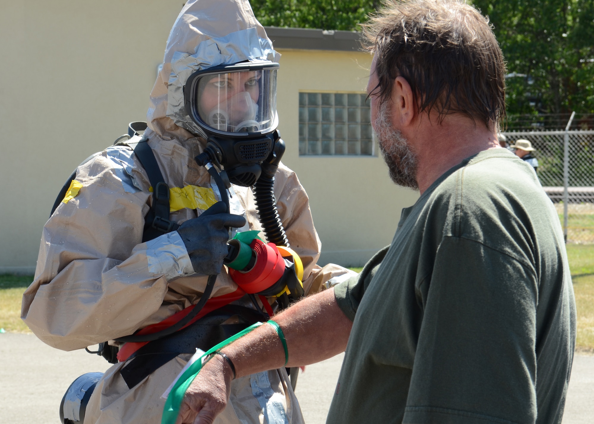 Airman 1st Class Jill Fredrickson, a medical services apprentice for the Wisconsin Air National Guard's 115th Fighter Wing, and member of the Wisconsin Chemical, Biological, Radiological, Nuclear, and High Explosive Enhanced Response Force Package (CERFP) uses colored ribbon to triage casualties during a June 13 training exercise at Volk Field Combat Readiness Training Center. Wisconsin is the 18th state to obtain the CERFP certification. The team, comprised of members of the Wisconsin Air and Army National Guard, provides search and rescue, decontamination and medical support in the event of natural or man-made disasters. 115th Fighter Wing photo by Airman 1st Class Andrea F. Liechti