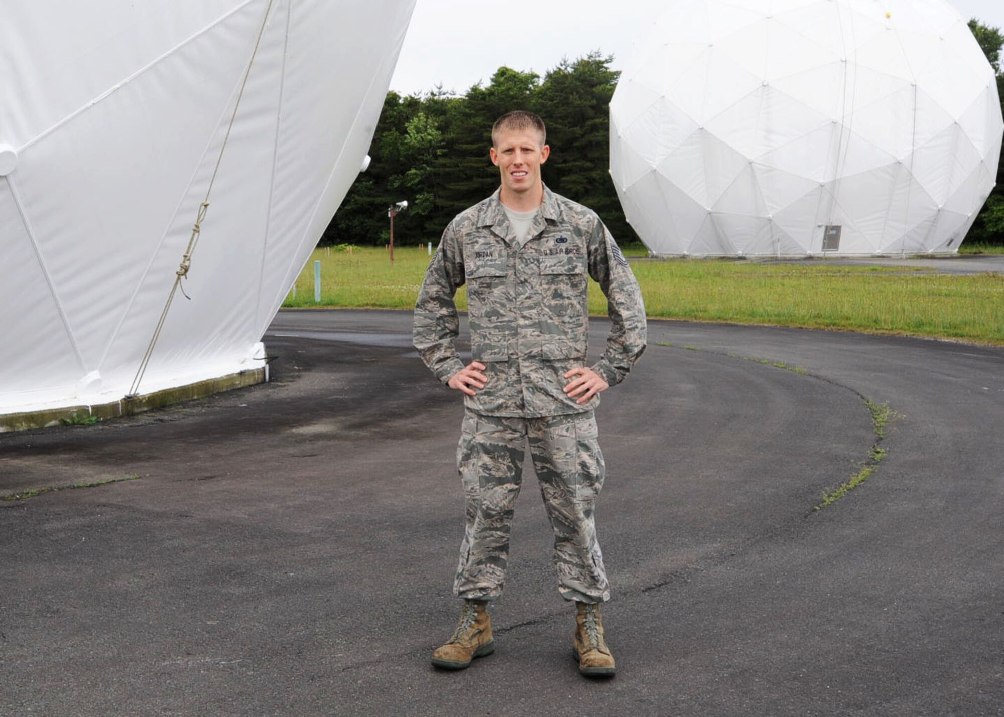 U.S. Air Force Tech. Sgt. Kevin Jordan, 373rd Support Squadron NCO in charge of satellite support, is this week's spotlight Airman at Misawa Air Base, Japan. Jordan was chosen for his dedication and influential work ethic. During his off-duty hours, Jordan coaches basketball to middle school children and teaches Japanese children seven years and under the English language in Hachinohe, Japan. (U.S. Air Force photo by Airman Kenna Jackson/Released)