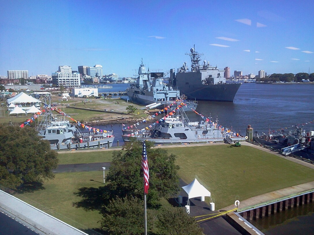 U.S. Navy vessels dock and nest at the newly refurbished Fort Norfolk wharf area during the 2012 OpSail Parade of Sail, held in early June. The Navy ships offered the public several days of open house vessel tours throughout the weeklong festivities. (U.S. Army photo/ Mark Haviland)