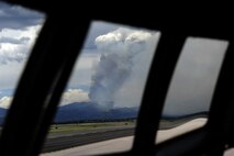 A smoke plume rises above Colorado Springsm Colo., from the Waldo Canyon Fire June 27. Air Force Reserve and Air National Guard C-130 air crews and ground personnel responded to the blaze using the Modular Airborne Fire Fighting System in conjunction with the U.S. Forest Service. MAFFS operations at based at Peterson Air Force Base, Colo. (U.S. Air Force photo/Staff Sgt. Stephany D. Richards)