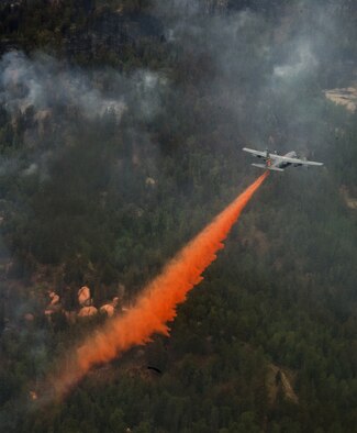 A Modular Airborne Fire Fighting System-equipped C-130 Hercules assigned to the Wyoming Air National Guard's 153rd Airlift Wing lays a line of fire retardant June 27 against the Waldo Canyon Fire near Colorado Springs, Colo. Four MAFFS-equipped aircraft, two from the 153rd AW and two from the Air Force Reserve Command's 302nd AW, flew in support of the U.S. Forest Service to fight the Colorado wildfire. (U.S. Air Force photo/Staff Sgt. Stephany D. Richards)