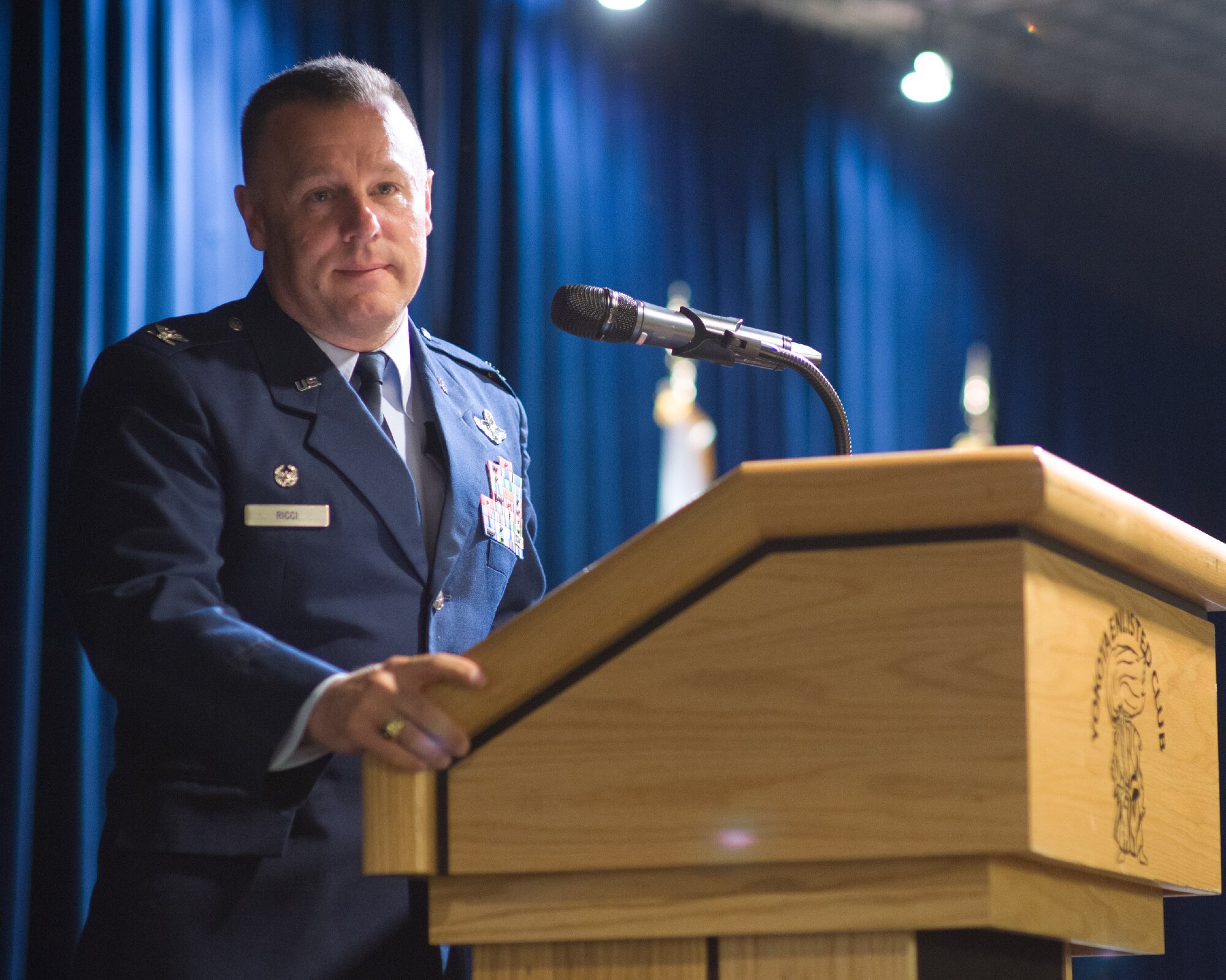 YOKOTA AIR BASE, Japan -- Col. Robert Ricci, 515th Air Mobility Operations Group commander, gives his final speech during the 515th AMOG change of command ceremony at Yokota Air Base, Japan, on June 28, 2012.  The change of command is a traditional military ceremony in which the departing commander assembles his troops for presentation to the incoming commander. (U.S. Air Force photo by Osakabe Yasuo)