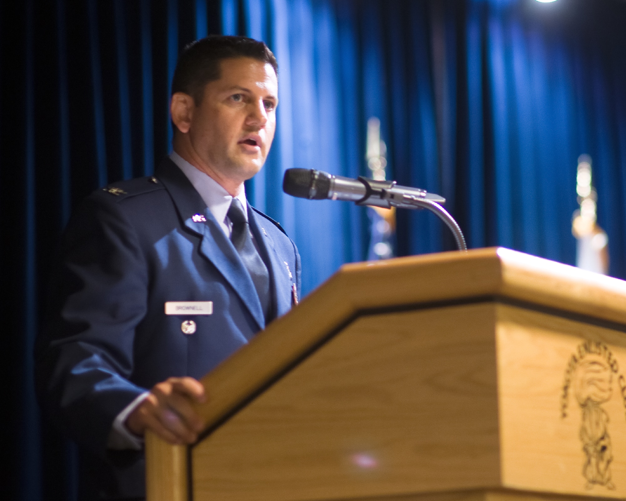 YOKOTA AIR BASE, Japan -- Col. Kenneth Brownell, 515th Air Mobility Operations Group commander, gives a speech after taking command during the 515th AMOG change of command ceremony at Yokota Air Base, Japan, on June 28, 2012. Brownell was the United States Transportation Command liaison officer to the United Nations Command, Combined Forces Command, and U.S. Forces - Korea, Yongsan Garrison, Republic of Korea. (U.S. Air Force photo by Osakabe Yasuo)
