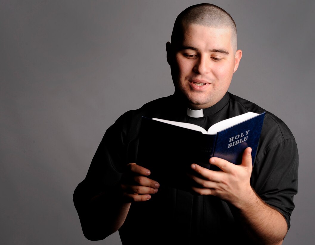 U. S. Air Force Second Lt. Seth DeBartolo, chaplain candidate assigned to the 9017th Air Reserve Squadron, Robins Air Force Base, Ga., reads aloud from the Bible June 26 at Mountain Home Air Force Base, Idaho. The Air Force Chaplain Candidate Program is a special opportunity for seminary students from all faiths to experience ministering to active duty Air Force personnel. (U. S. Air Force photo/Senior Airman Benjamin Sutton)