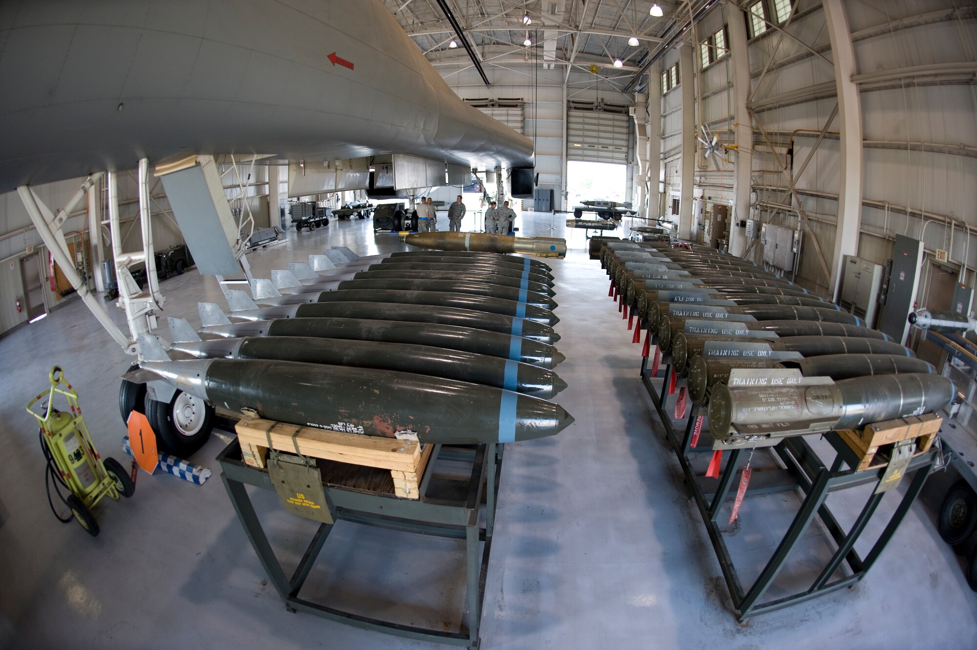 7th Aircraft Maintenance Squadron B-1 weapons load crew team members prepare for the Weapons Load Crew of the Quarter competition held at the load crew training facility June 28, 2012, at Dyess Air Force Base, Texas. The competition was comprised of a dress and appearance inspection, physical fitness test and a timed weapons loading evaluation. (U.S. Air Force photo by Staff Sgt. Richard P. Ebensberger/ Released)