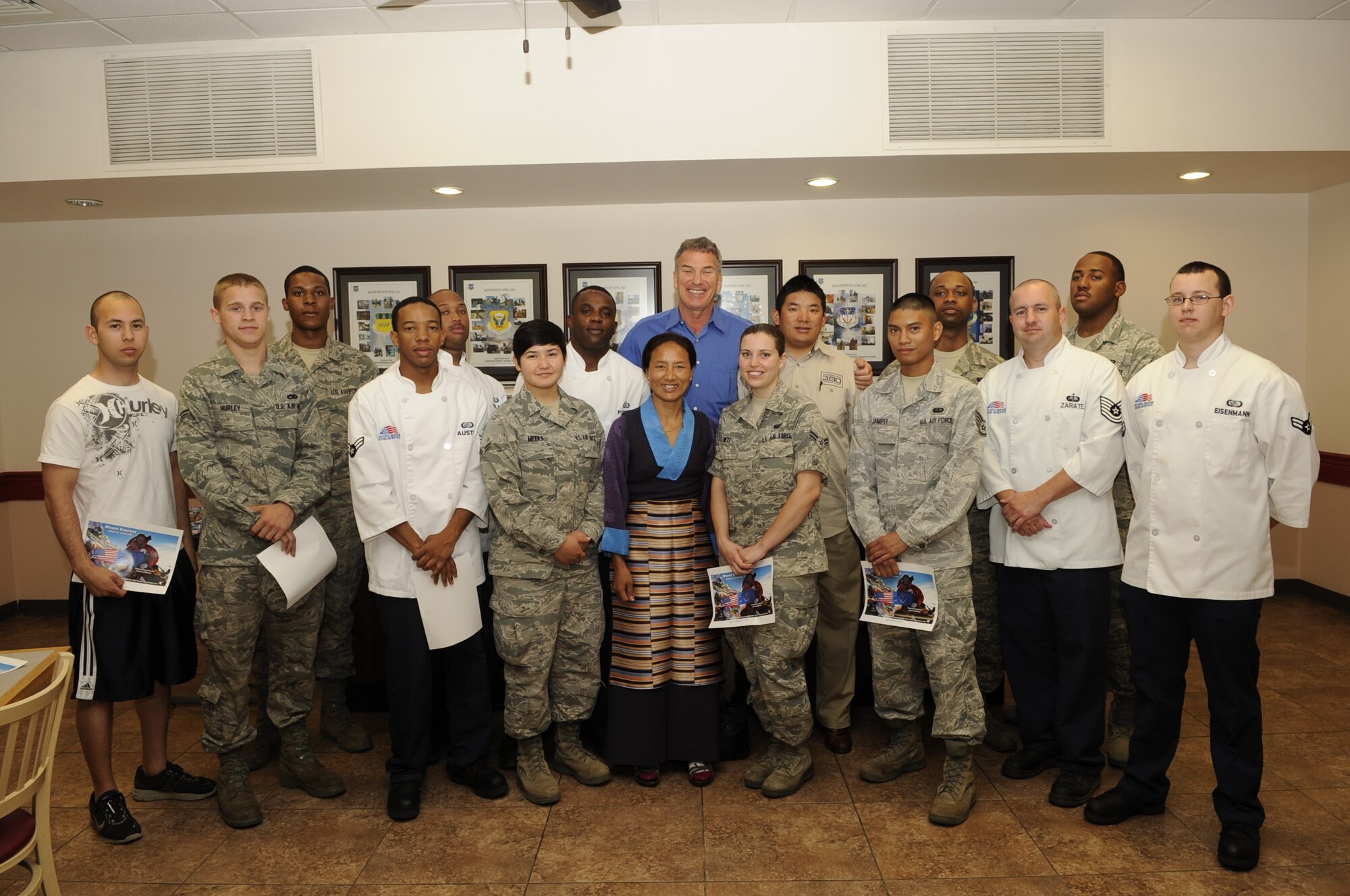 Chhiring Dorje Sherpa and his wife Dawa, in addition to Tom Whittaker, visit with Air Force Global Strike Command Airmen during a visit here June 27 (U.S. Air Force photo by Airman 1st Class Joseph A. Pagán Jr.). 