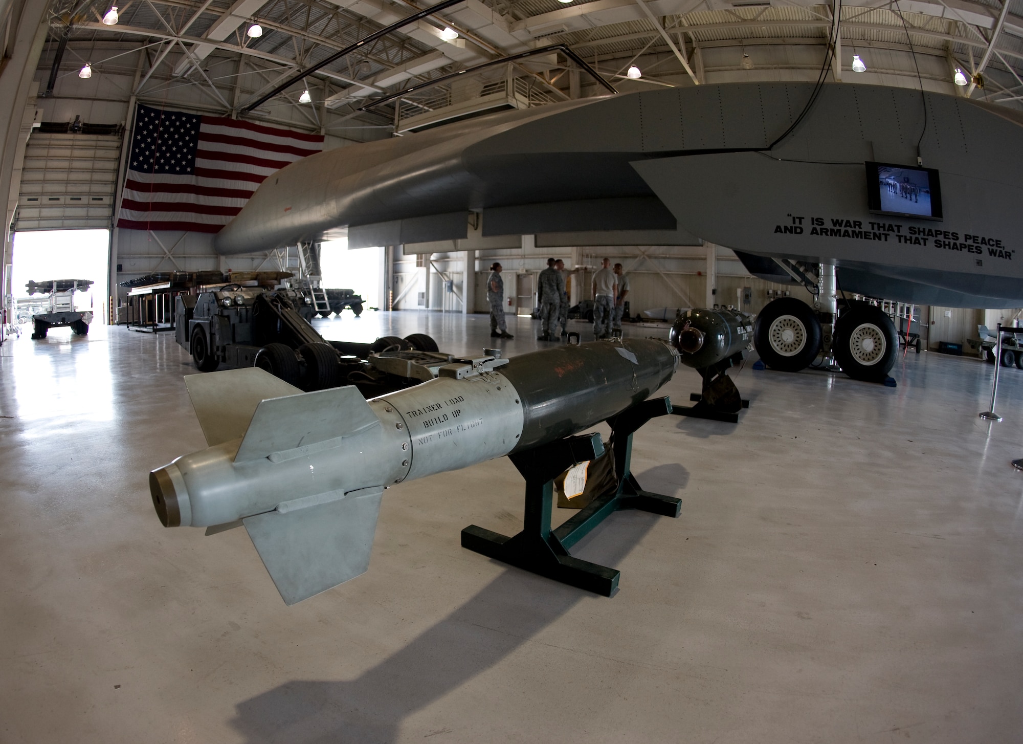7th Aircraft Maintenance Squadron B-1 weapons load crew team members, prepare for the Weapons Load Crew of the Quarter competition held at the load crew training facility June 28, 2012, at Dyess Air Force Base, Texas. The competition was comprised of a dress and appearance inspection, physical fitness test and a timed weapons loading evaluation. (U.S. Air Force photo by Staff Sgt. Richard P. Ebensberger/ Released)