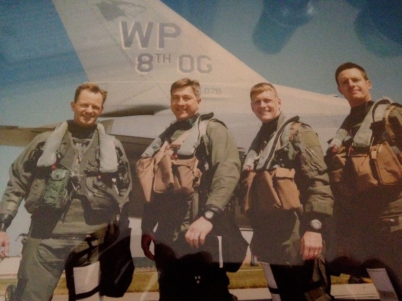 Col. Ken Rizer, 11th Wing/Joint Base Andrews commander, far left, stands with fellow Wolf Pack fighter pilots after completing their fini flight. (Courtesy photo)