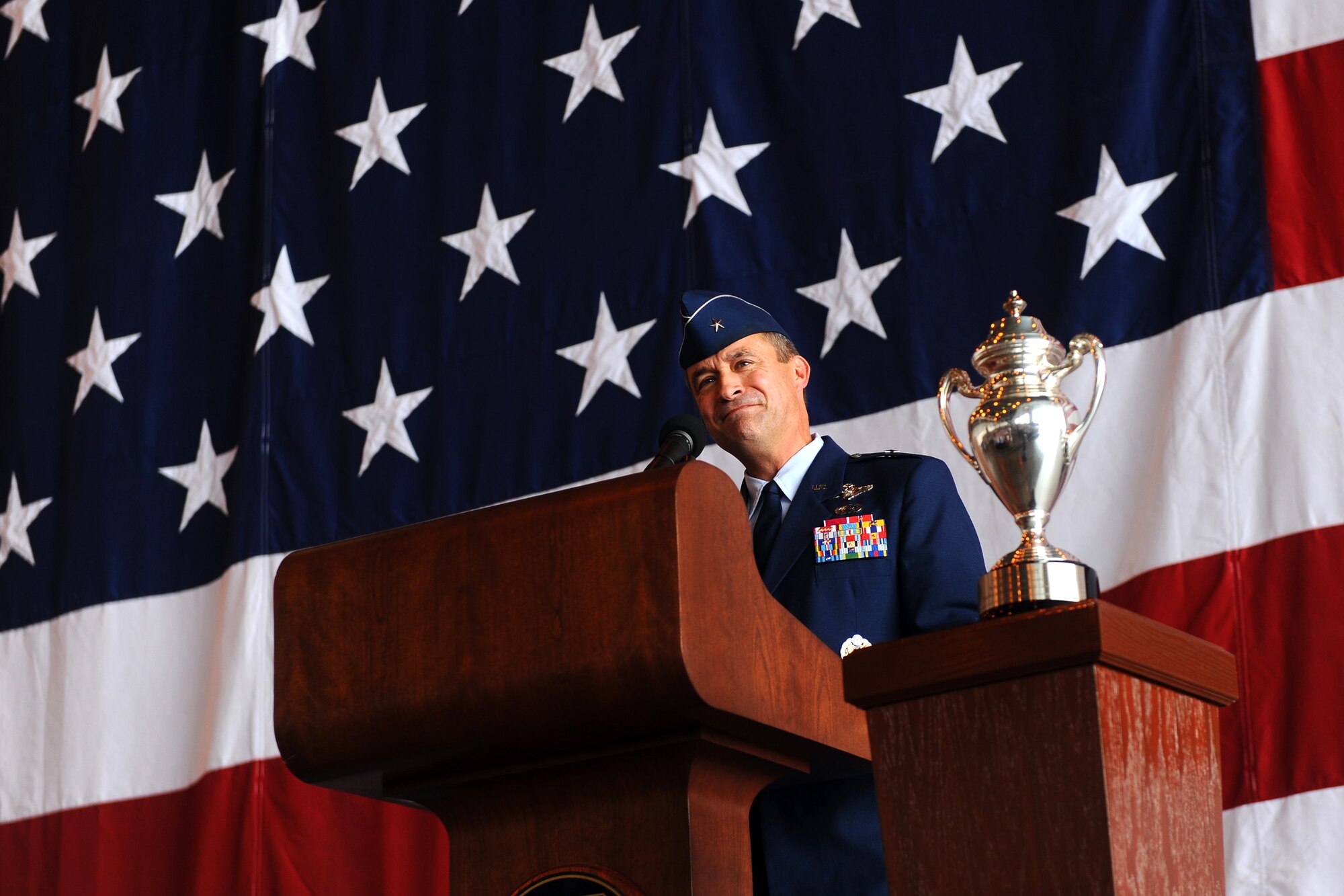 U.S. Air Force Brig. Gen. Donald Bacon, outgoing commander of the 55th Wing, gives his closing remarks during the change of command ceremony held June 28 at Offutt Air Force Base, Neb. Bacon leaves the wing for the Pentagon where he will be the director of intelligence, surveillance and reconnaissance strategy, plans, doctrine and force development.  (U.S. Air Force Photo by Josh Plueger/Released)
