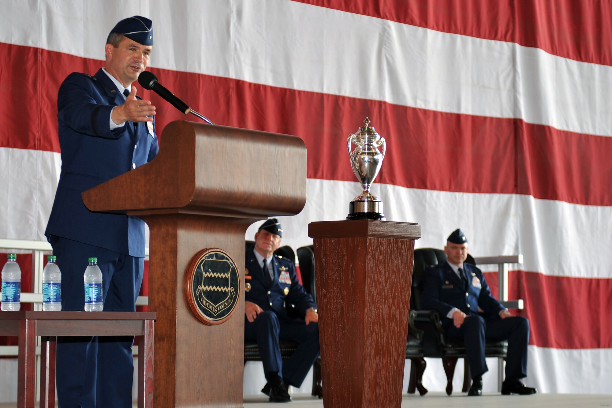 Brig. Gen. Donald Bacon, outgoing 55th Wing commander, says a few words before departing during a formal change of command ceremony June 28 in Dock 1 of the Bennie Davis Maintenance Facility at Offutt Air Force Base, Neb. A large number of Airmen, civilians, family members and distinguished visitors were in attendance for the change of command. (U.S. Air Force photo by Jeff W. Gates/Released)