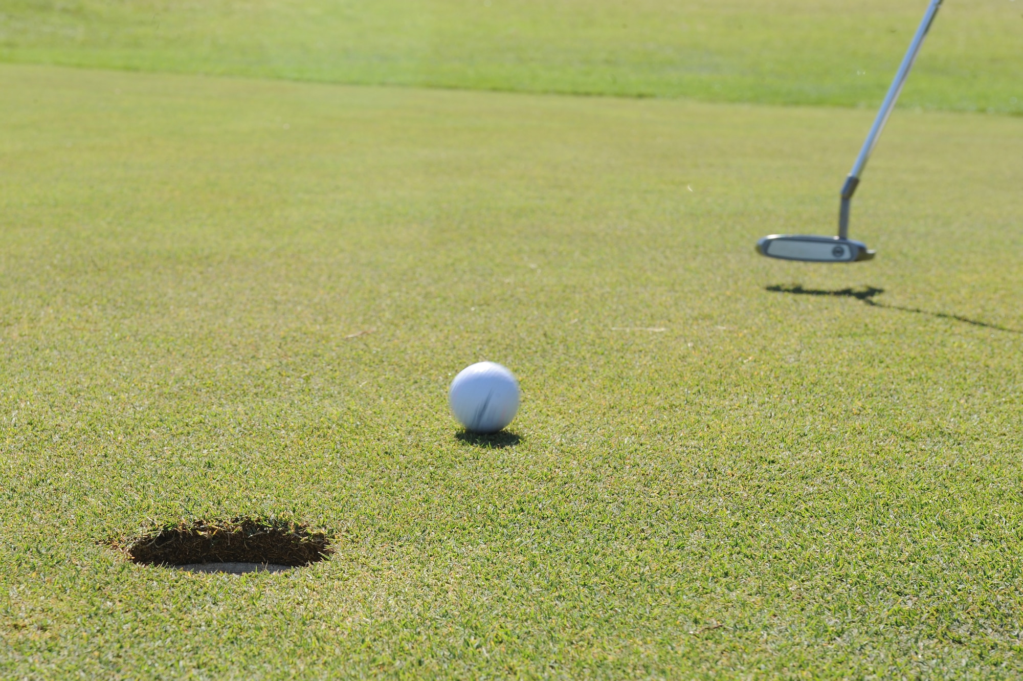 A ball is hit toward a hole on the Three Eagles Golf Course at Seymour Johnson Air Force Base, N.C., June 27, 2012. The 18-hole course is open to Department of Defense ID card holders. (U.S. Air Force photo/Airman 1st Class John Nieves Camacho/Released)