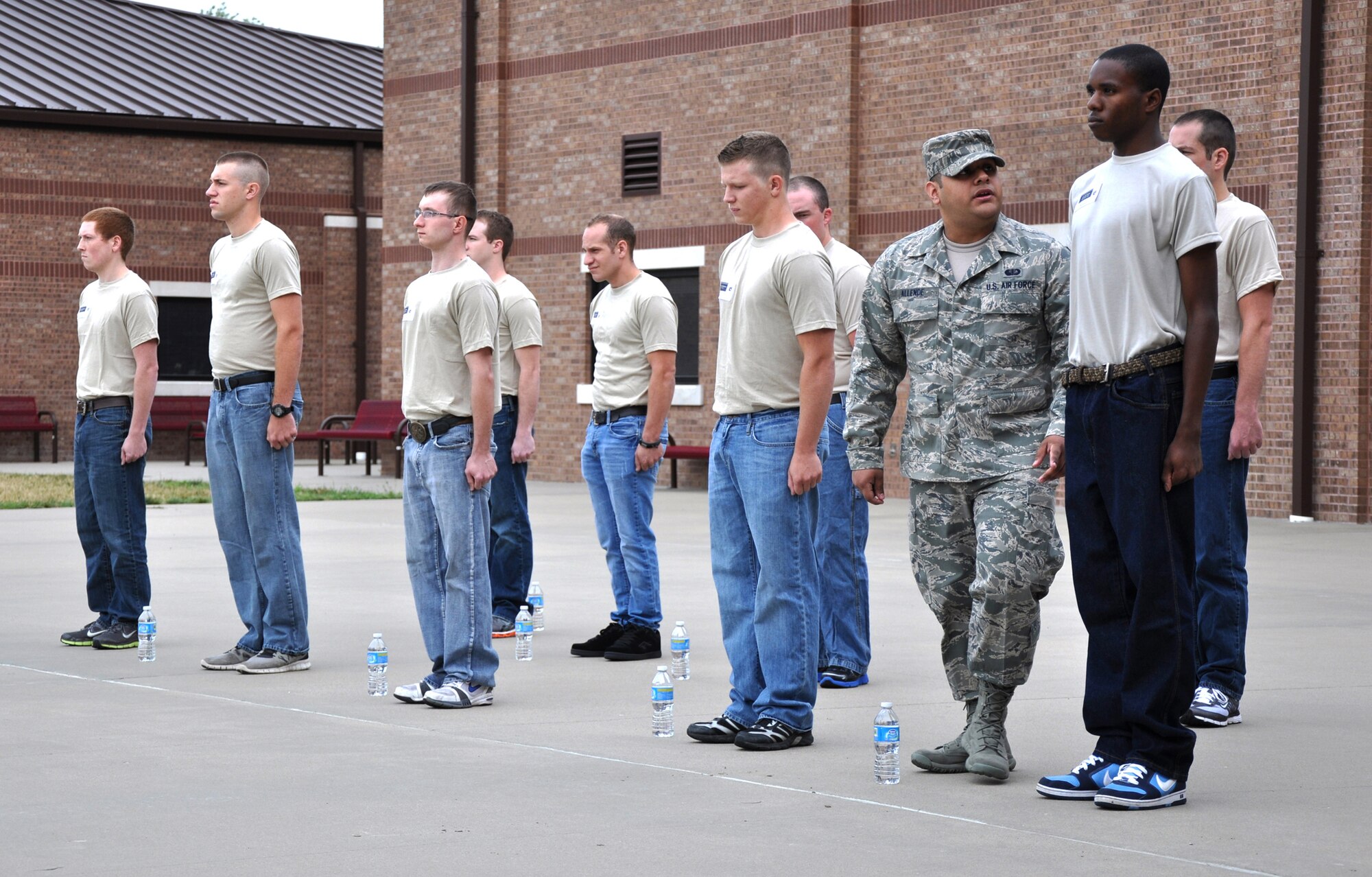 Staff Sgt. Alberto Allende, 442nd Development and Training Flight instructor, walks through ranks providing on-the-spot guidance to trainees on proper postures while they execute facing movements during the June 2012 unit training assembly. The 442nd DTF is part of the 442nd Fighter Wing, an A-10 Thunderbolt II Air Force Reserve unit at Whiteman Air Force Base, Mo. (U.S. Air Force photo/Tech. Sgt. Kent Kagarise)   
