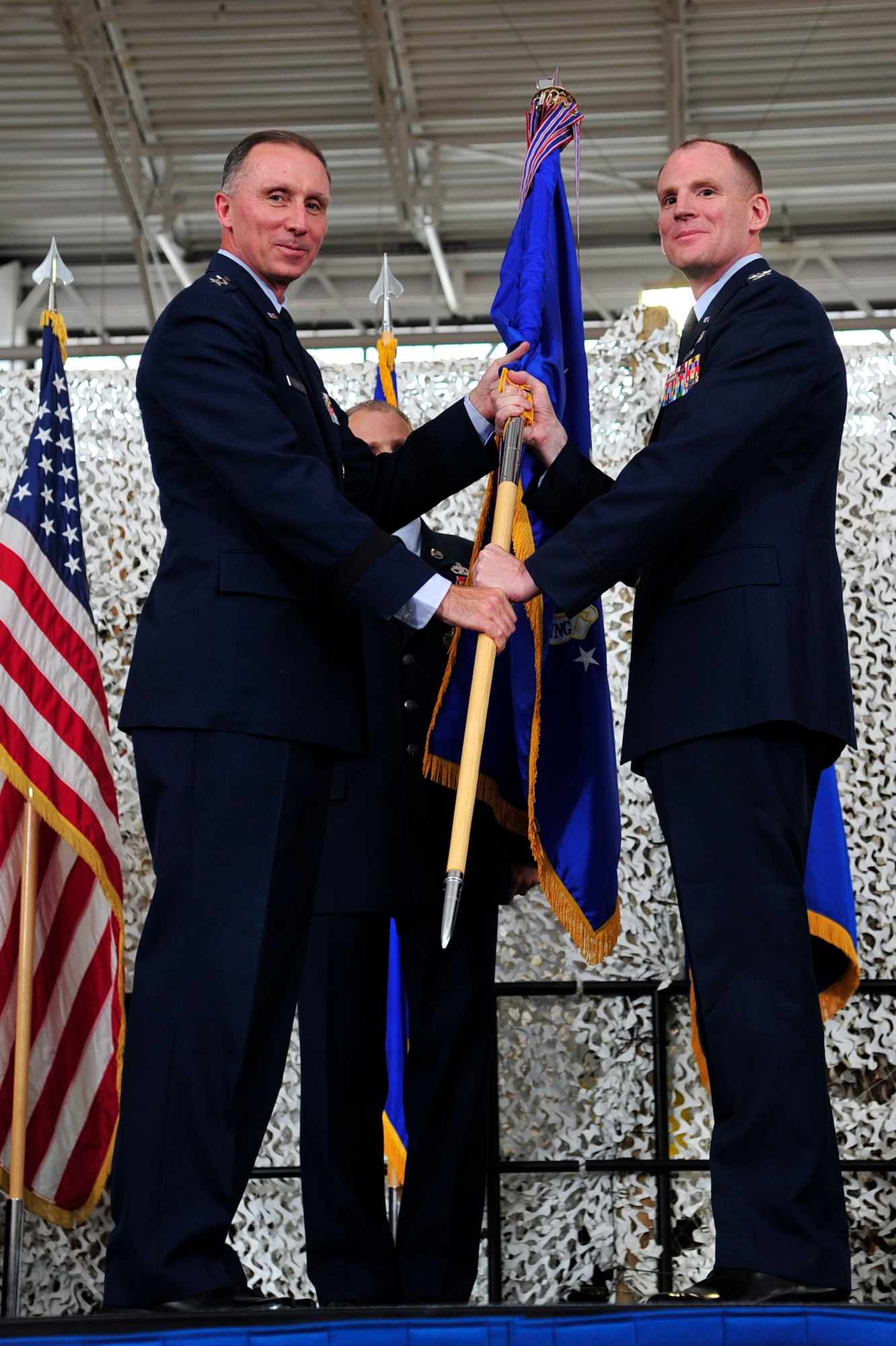 Col. Martin A. Chapin receives command of the 621st Contingency Response Wing from Maj. Gen. William J. Bender, commander, U.S. Air Force Expeditionary Center, in a ceremony at the 621st Contingency Response Wing’s Global Reach Deployment Center June 28, 2012, at Joint Base McGuire-Dix-Lakehurst, N.J. Chapin took command from Col. Chris B. Patterson, who will be moving to the USAFEC. (U.S. Air Force photo/Tech. Sgt. Parker Gyokeres)
