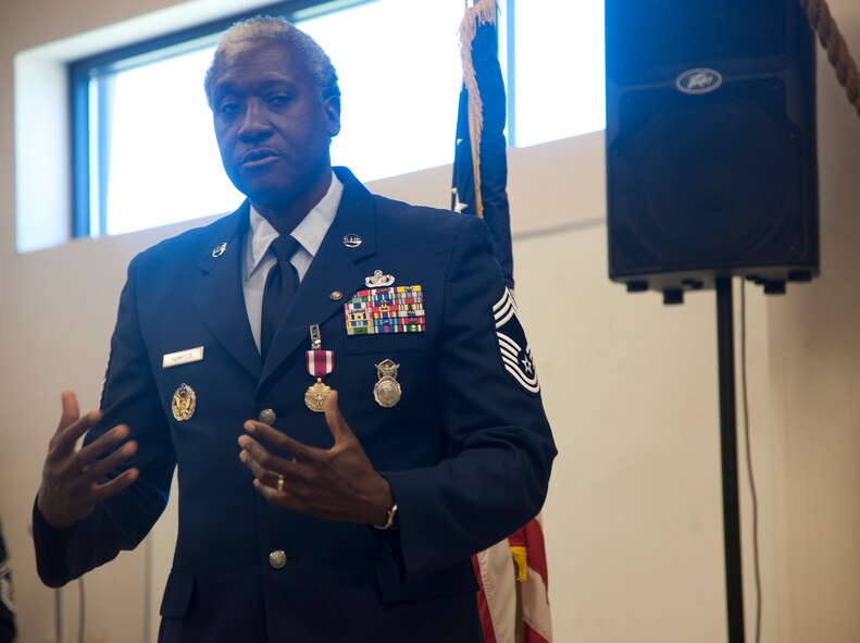 Retired U.S. Air Force Chief Master Sgt. John Hampton, Air Combat Command security forces manager, speaks about his career, at Moody Air Force Base, Ga., June 27, 2012.  Hampton gave thanks to everyone who helped him in his career and everyone who attended his retirement ceremony. Hampton is a former 823d Base Defense Squadron security forces manager and traveled from Langley Air Force Base, Va., to retire, because he said it felt like being home. (U.S. Air Force photo by Airman 1st Class Paul Francis/Released)
