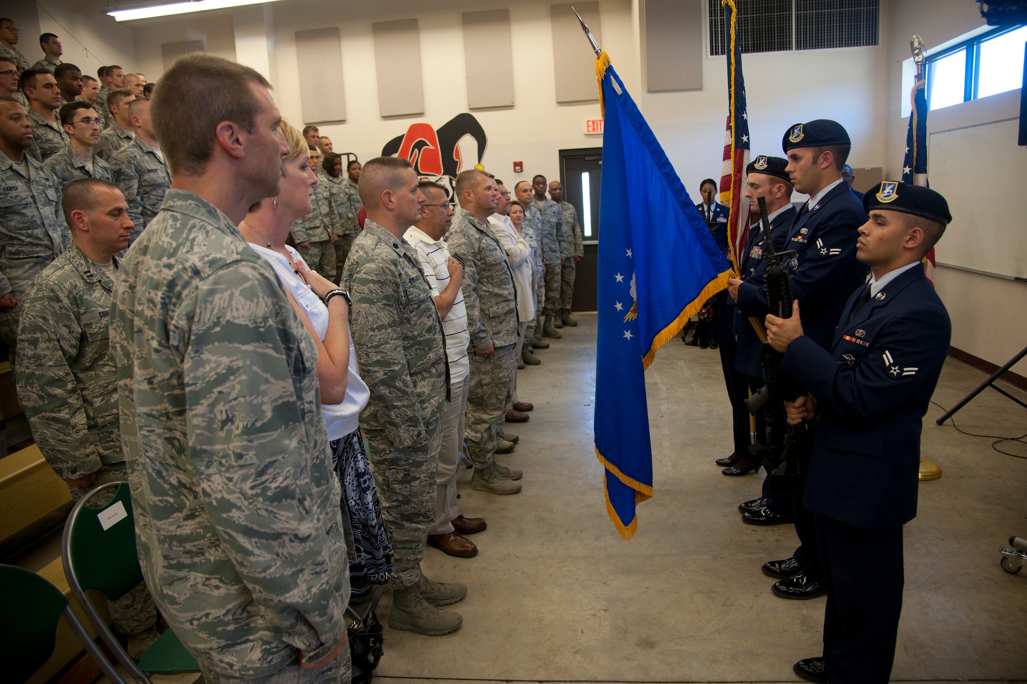 The Moody Air Force Base Honor Guard presents the colors during a retirement ceremony for U.S. Air Force Chief Master Sgt. John Hampton, June 27, 2012, at Moody Air Force Base, Ga. Hampton was stationed at Moody from 2007 to 2010 as the 823d Base Defense Squadron security forces manager. (U.S. Air Force photo by Airman 1st Class Paul Francis/Released)
