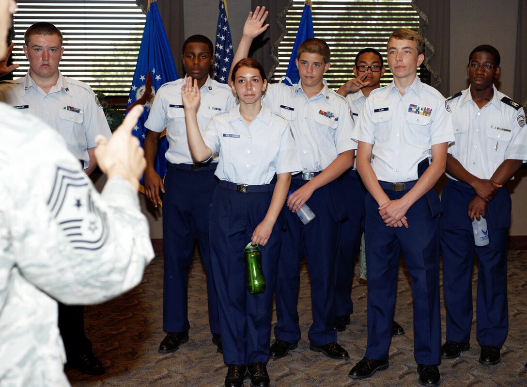 A group of Air Force JROTC cadets ask Chief Master Sgt. Richard Parsons, Air Combat Command command chief, questions about his experiences as an Airman during their visit to Langley Air Force Base, June 27, 2012.  The cadets, 87 in total, came to Langley during their summer leadership program to help prepare them for future leadership responsibilities. (U.S. Air Force photo by Tech. Sgt. Barry Loo/Released)