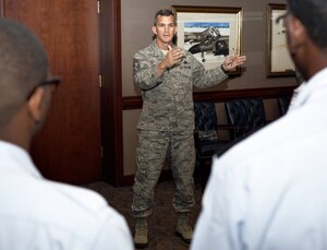Chief Master Sgt. Richard Parsons, Air Combat Command command chief, speaks to Air Force JROTC cadets at Langley Air Force Base, June 27, 2012.  The cadets visited Langley to learn about the Air Force mission and the experiences of Airmen currently serving in the Air Force. (U.S. Air Force photo by Tech. Sgt. Barry Loo/Released)