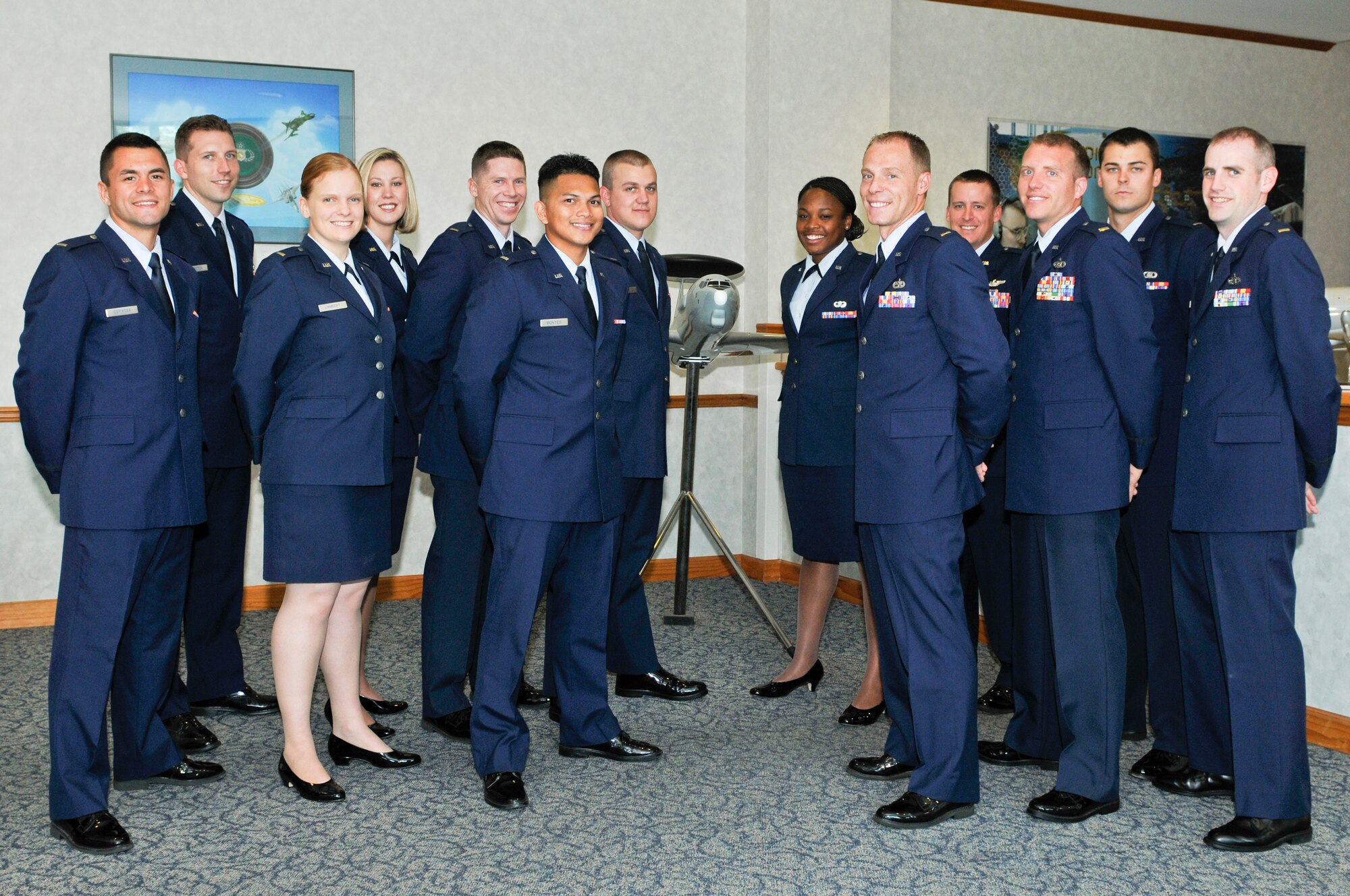 Graduate members of Air Battle Management Class 12013 pose for a celebratory photo after graduating on June 27, 2012. (U.S. Air Force photo by Susan Trahan) 
