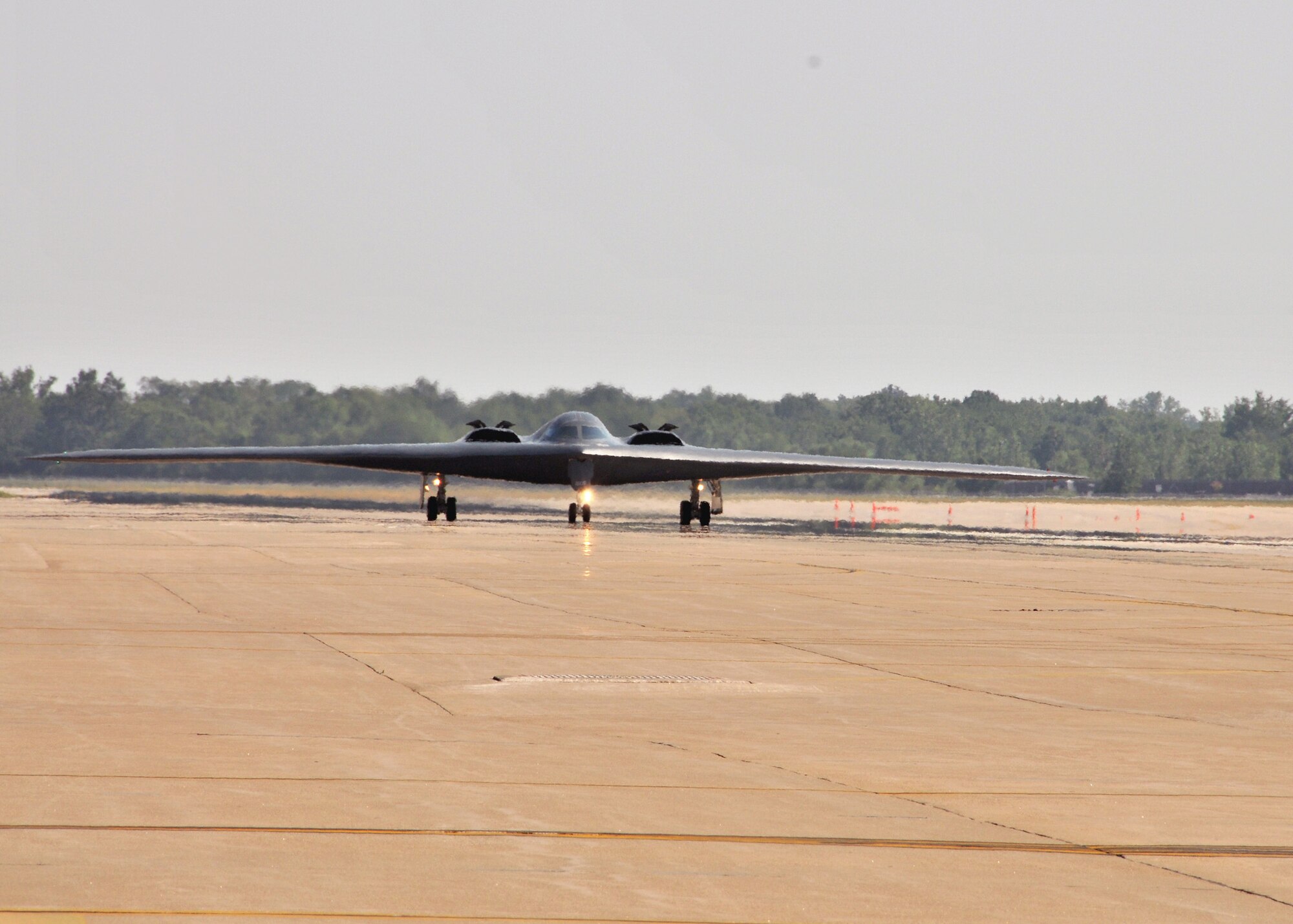 The B-2 "Spirit of Ohio" returns from a training mission, June 27.  Onboard, Lt. Col. Dave Thompson who with this mission, surpasses 1000 flying hours in a B-2 Stealth Bomber.  Thompson joins an elite group, which includes his co-pilot Maj Kennish.  Just two weeks prior, Maj Geoffrey Billingsley also flew past the 1000 flying hour mark.   Only 31 pilots have ever reached 1000 B-2 hours, and just thirteen still actively fly the B-2 Stealth Bomber.  Seven of these elite pilots are 131st Bomb Wing Missouri Air National Guard members at Whiteman Air Force Base:  Lt. Col. Rhett Binger,  Lt. Col. Mike Pyburn, Lt. Col. Dave Thompson,  Maj. Jared Kennish, Maj. John Avery,  Maj. Geoffrey Billingsley, and Lt. Col. Mike Means, who has over 1500 flying hours. (National Guard Photo by Senior Master Sgt. Mary-Dale Amison.  RELEASED)
