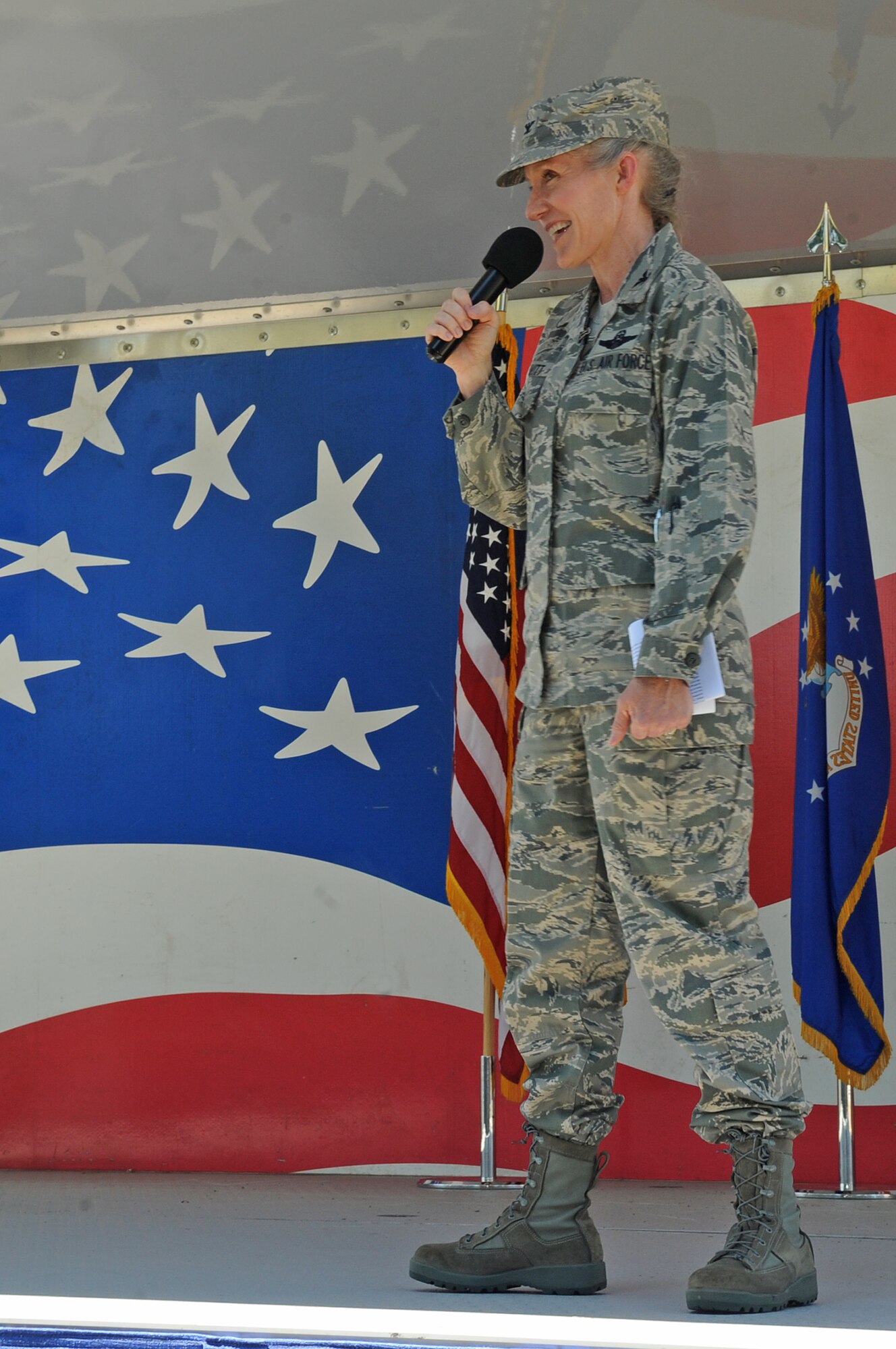 U.S. Air Force Col. Jeannie Leavitt addresses Airmen assigned to the 4th Fighter Wing during her first commander’s call on Seymour Johnson Air Force Base, N.C., June 27, 2012. A commander’s call is typically a forum where a commander speaks to his or her people regarding current or imminent topics and concerns. Leavitt, 4th FW commander, is a native of St. Louis. (U.S. Air Force photo/Airman 1st Class Aubrey Robinson/Released)