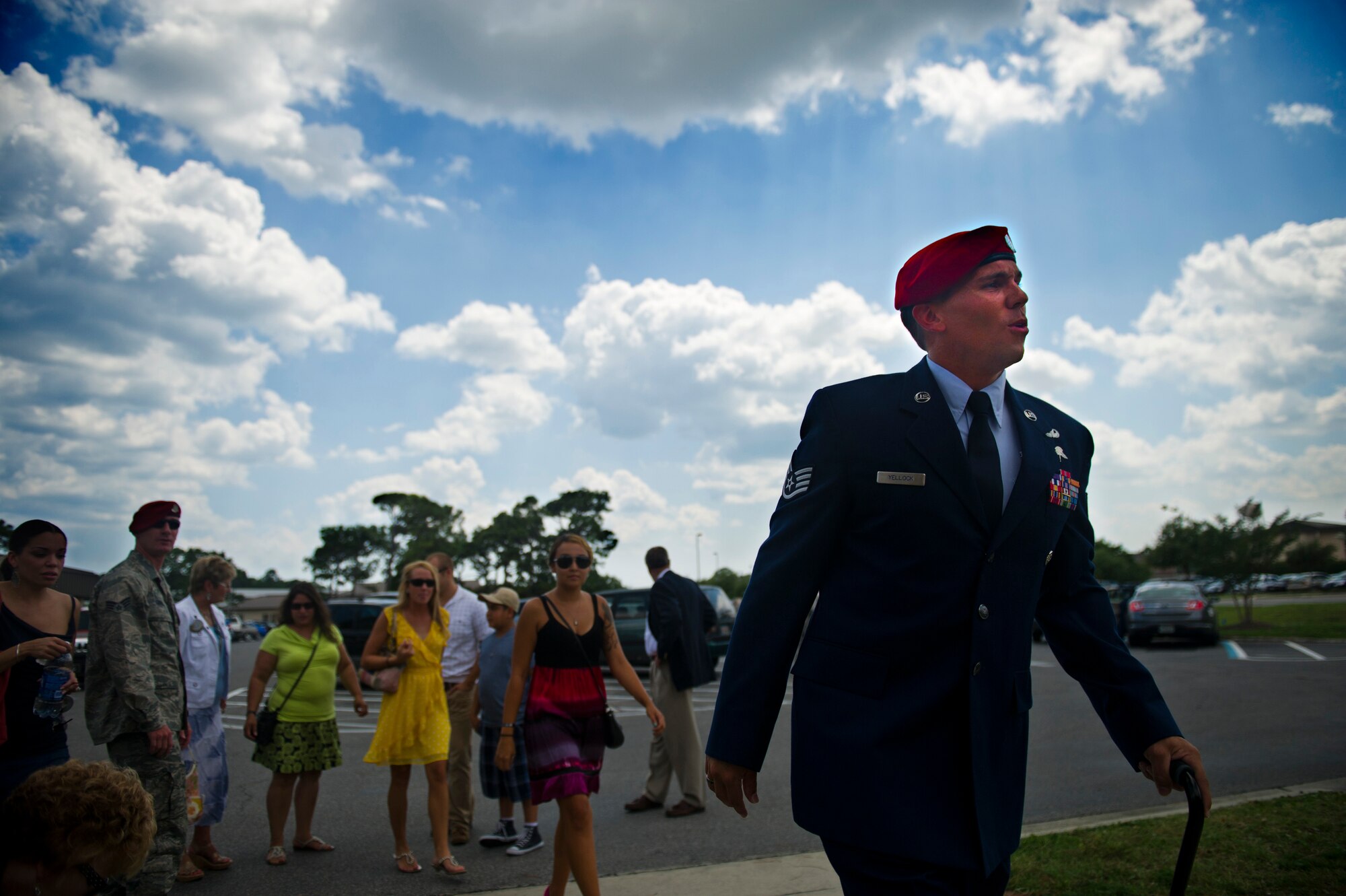 U.S. Air Force Staff Sgt. Johnnie Yellock Jr., a combat controller with the 23rd Special Tactics Squadron, walks to his Bronze Star Medal ceremony, June 26, 2012 at Hurlburt Field, Fla.  Yellock received the Bronze Star for his deployment to Afghanistan in 2011 -- a deployment in which he was significantly wounded by an Improvised Explosive Device. (U.S. Air Force photo by Staff Sgt. David Salanitri) 
