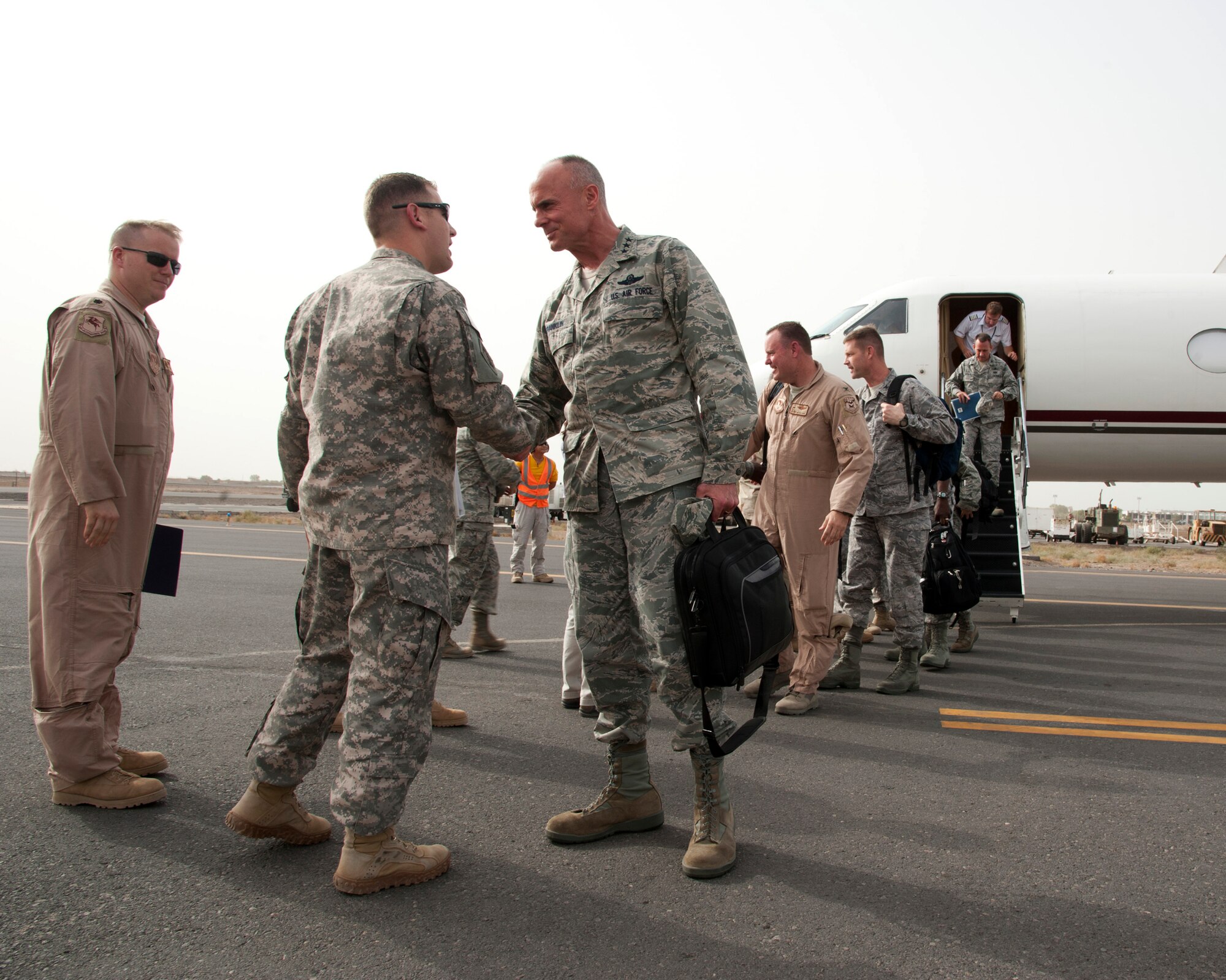 CAMP LEMONNIER, Djibouti – U.S. Air Force Lt. Gen. Craig A. Franklin, 3rd Air Force commander, is greeted by Joint Task Force – Horn of Africa personnel upon his arrival here June 25, 2012. Franklin visited Camp Lemonnier to meet with CJTF-HOA leadership and other U.S. Air Force assets. (U.S. Air Force photo by Senior Airman Lael Huss) 