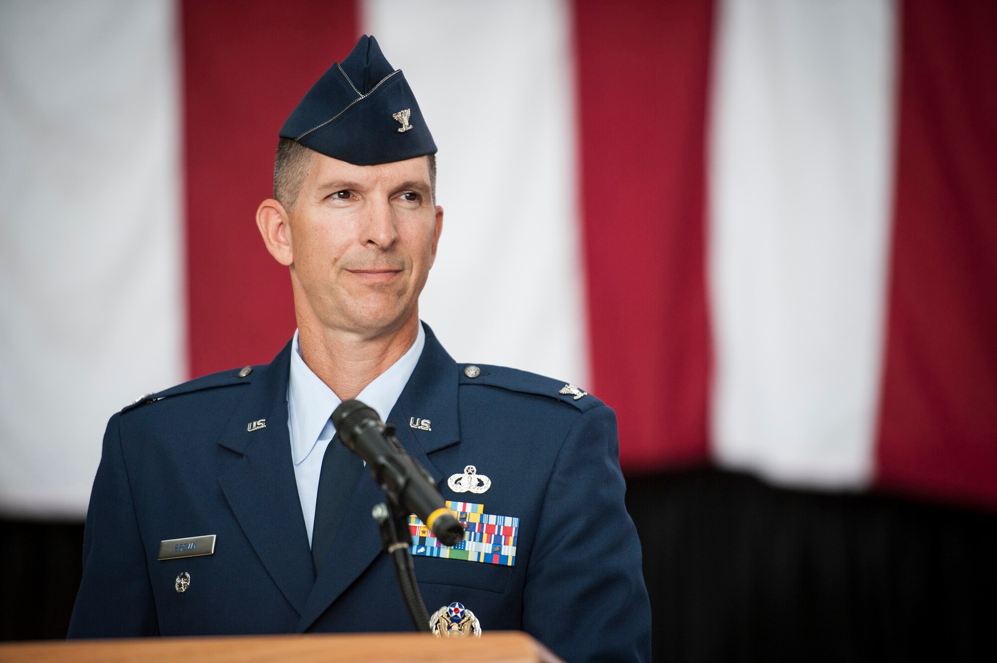 YOKOTA AIR BASE, Japan -- Col. Edward Brown, 374th Mission Support Group commander, smiles before addressing his command during the 374 MSG change of command ceremony at Yokota Air Base, Japan, on June 27, 2012. Brown spoke about how the 374 MSG was in excellent form and that he wished to continue the legacy of excellence left by his predecessor, Col. Todd Freece. (U.S. Air Force photo by Tech. Sgt. Samuel Morse)