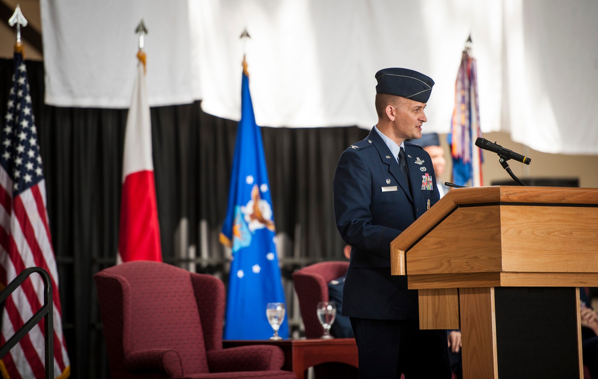 YOKOTA AIR BASE, Japan -- Col. Bill Knight, 374th Airlift Wing commander, talks about the accomplishments of the incoming and outgoing commanders during the 374th Mission Support Group change of command ceremony at Yokota Air Base, Japan, on June 27, 2012. Knight specifically spoke about all the challenges the 374 MSG faced with new facilities, natural disasters and the awards it won for its efforts. (U.S. Air Force photo by Tech. Sgt. Samuel Morse)