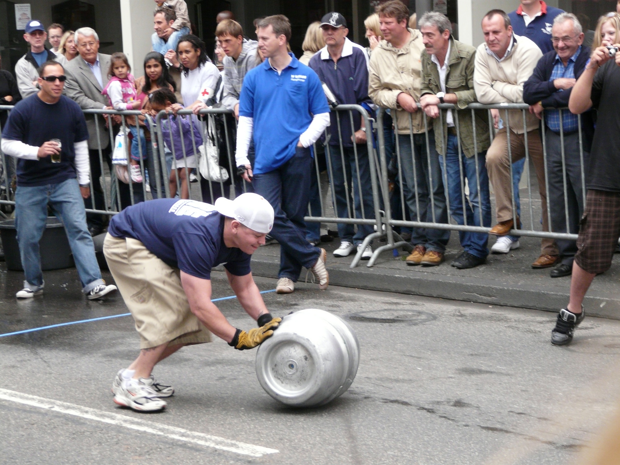 BITBURG, Germany - One highlight event of the Bitburg folk festival is the traditional Bitburg beer keg rolling contest, which begins at 2:30 p.m. July 7 and during which approximately 20 teams meet on Triererstrasse to hustle 50-liter beer barrels down a 100-meter course.  A few base members traditionally participate in the event. Other festival highlights include the introduction of all of the folk dancing groups from up to 15 European countries as they walk into the festival tent at 8 p.m. July 7 and a folk festival parade with all participating groups marching through and dancing in the streets of Bitburg at 2:30 p.m. July 8. (U.S. Air Force photo by Kornelia Pitsch/Released)