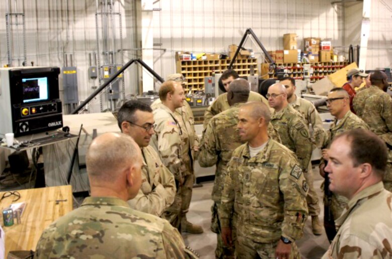 BAGRAM AIRFIELD, Afghanistan — U.S. Army Research, Development and Engineering Command Field Assistance in Science and Technology-Center, or RFAST-C, engineers and technicians discuss prototype integration facility capabilities with senior noncommissioned officers from the 18th Engineer Brigade.