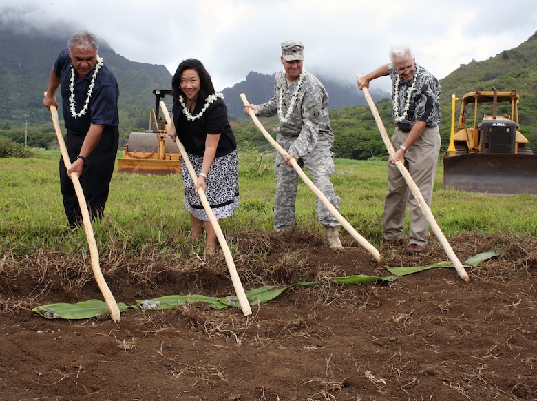 The Department of Land and Natural Resources and the U.S. Army Corps of Engineers broke ground today on the Kawainui Marsh Environmental Restoration Project in Kailua, O‘ahu. The project will increase populations of endangered waterfowl, create scenic open space, reduce upland runoff to coastal reefs and remove invasive weeds from the marsh. Pictured from left to right breaking ground are William J. Aila, Jr., DLNR chairperson, Staff Member Jennifer Wooten representing Sen. Daniel K. Inouye, Honolulu District Commnder Lt. Col. Douglas B. Guttormsen and Paul Conry, Division of Forestry and Wildlife administrator.