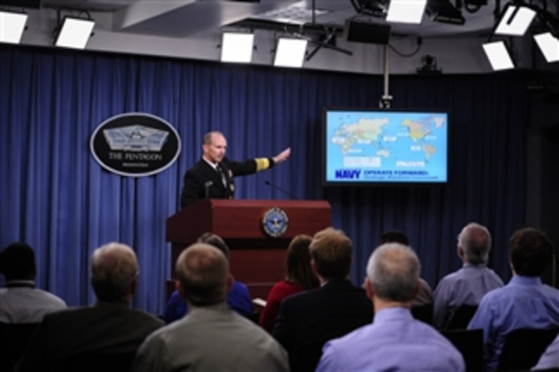 Chief of Naval Operations Adm. Jonathan Greenert gestures toward a slide showing numbers and locations of ships as he talks to the media about the status of the Navy during a press conference in the Pentagon in Arlington, Va., on June 27, 2012.  Greenert also discussed the Navy's strategic 60-percent strategic balance of forces in the Asia-Pacific.  