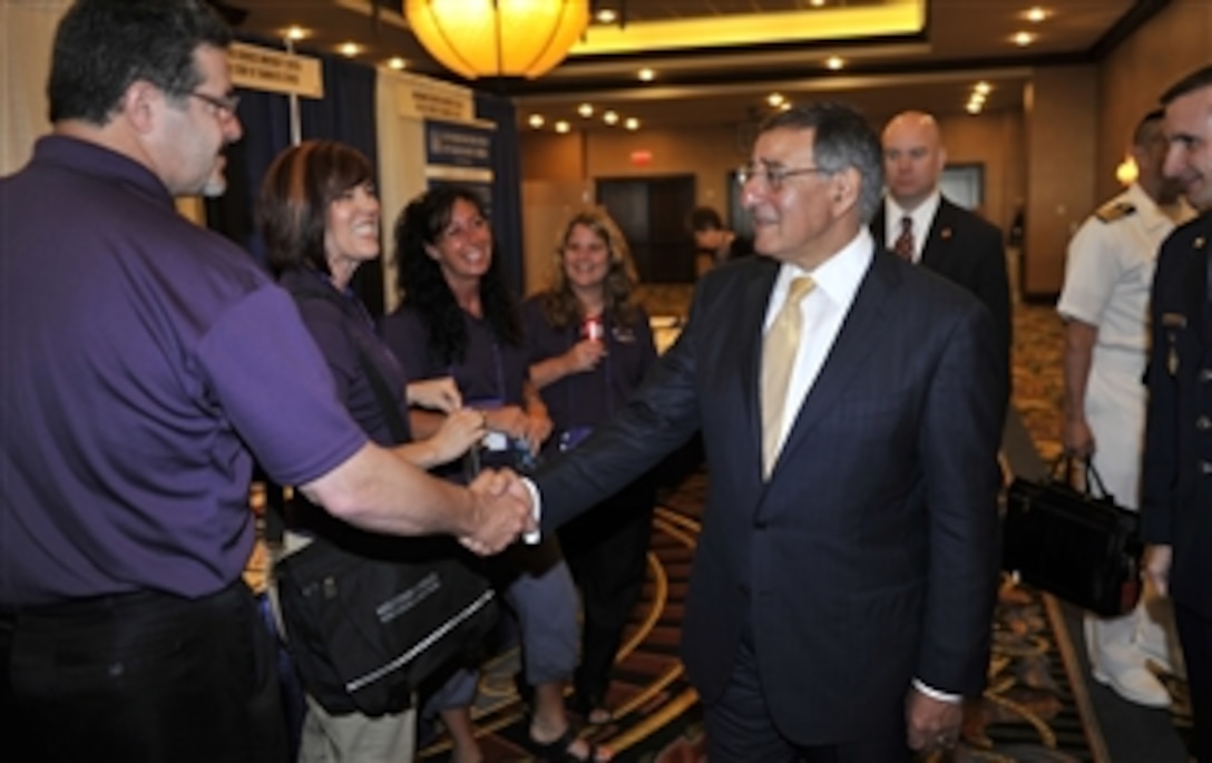 Secretary of Defense Leon E. Panetta greets attendees at the Military Child Education Coalition convention at the Military Child Education Coalition convention held at the Gaylord Texan in Grapevine, Texas, on June 27, 2012.  Panetta earlier delivered the keynote address to the convention audience.  